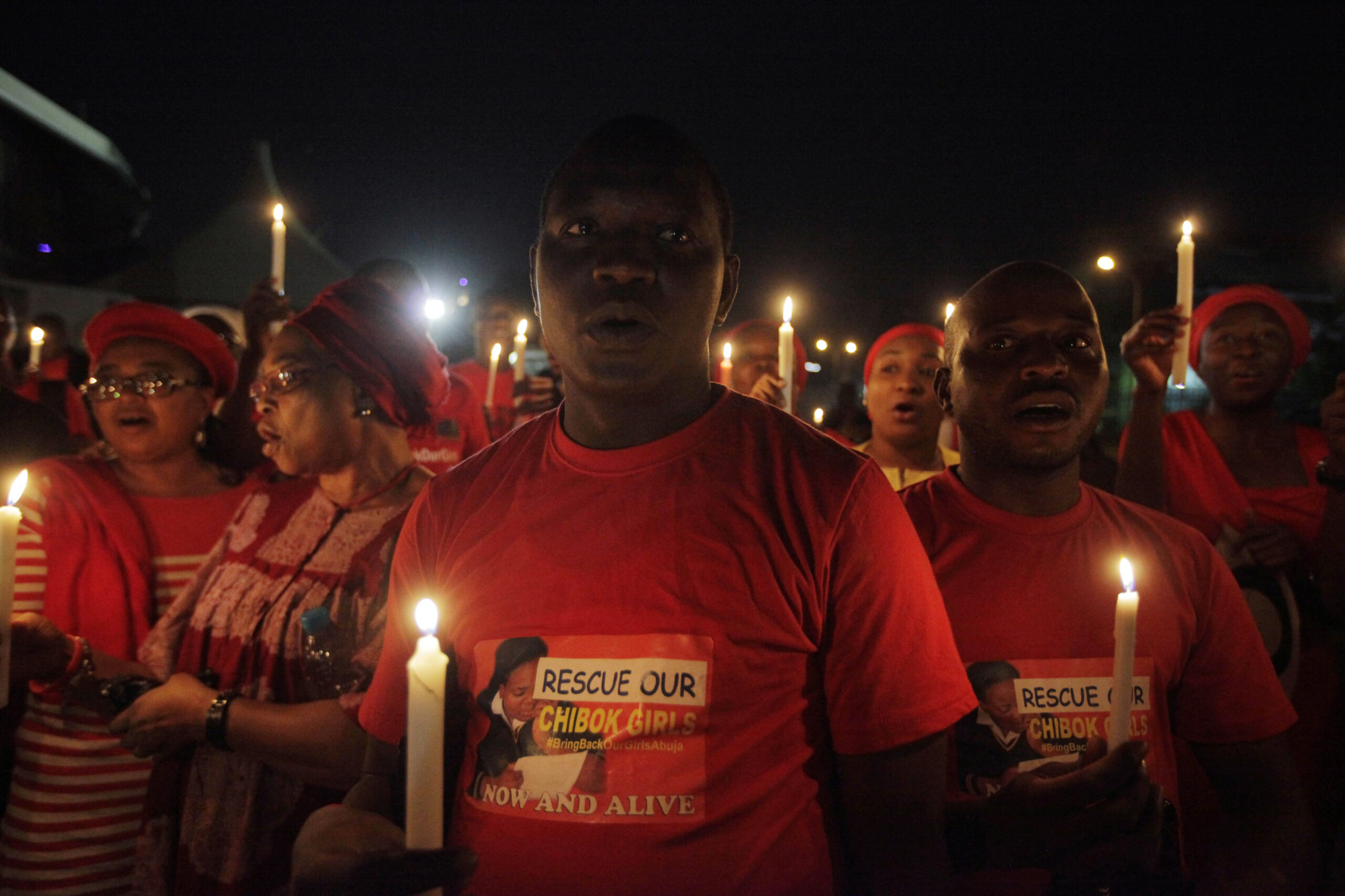 Men and Women hold candle light  during a vigil to mark thirty days since the girls of Government secondary school Chibok  were Kidnapped in Abuja, Nigeria, Wednesday, May 14, 2014. Nigeria's government is ruling out an exchange of more than 270 kidnapped schoolgirls for detained Islamic militants, Britain's top official for Africa said Wednesday.
President Goodluck Jonathan has "made it very clear that there will be no negotiation with Boko Haram that involves a swap of abducted schoolgirls for prisoners," Mark Simmonds, British foreign office minister, told journalists in the Nigerian capital, Abuja. (AP Photo/Sunday Alamba) (Sunday Alamba)
