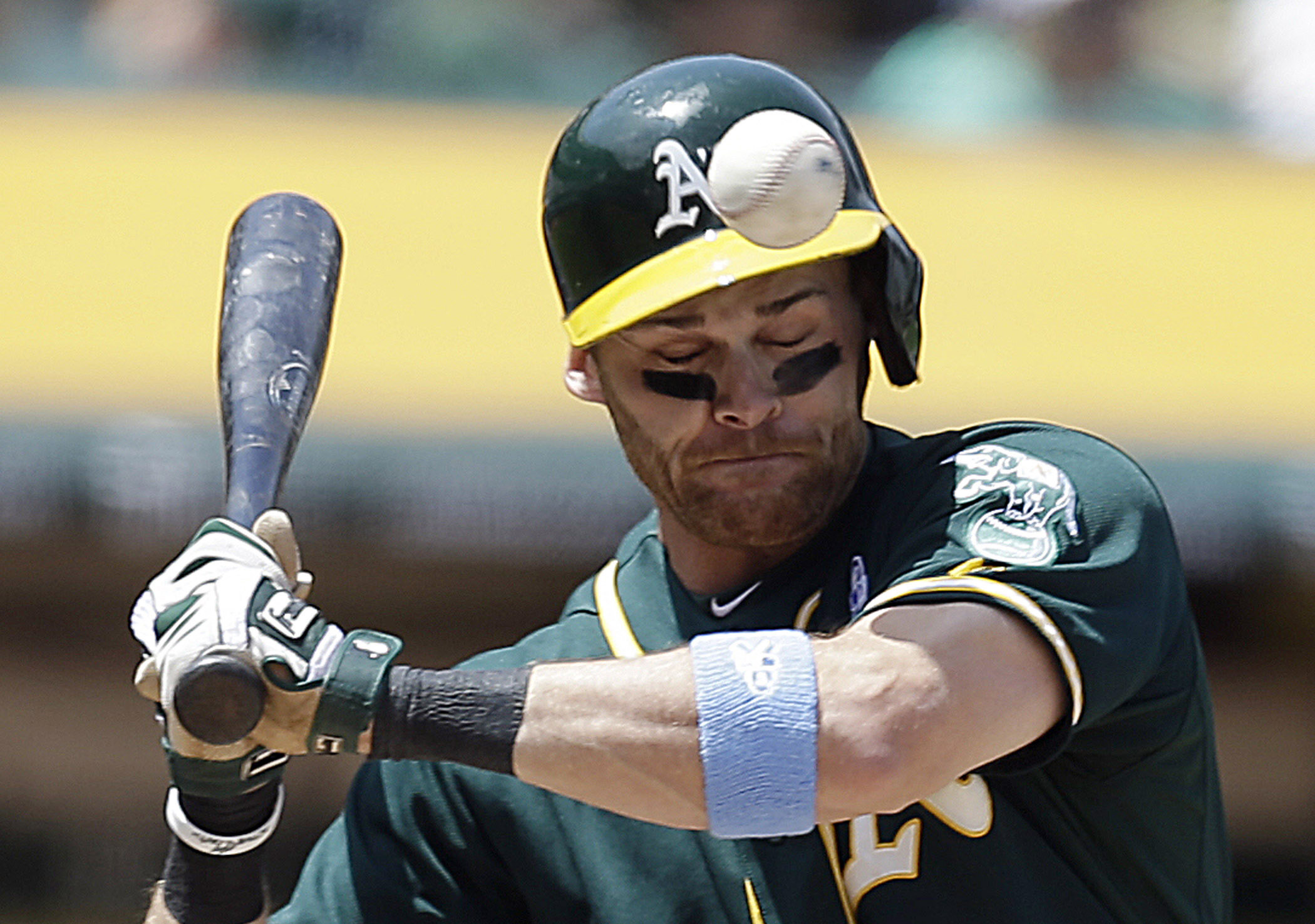 10ThingstoSeeSports - Oakland Athletics' Craig Gentry is hit on the helmet by a pitch thrown by New York Yankees' Jose Ramirez in the fourth inning of a baseball game on Sunday, June 15, 2014, in Oakland, Calif. (AP Photo/Ben Margot, File) (AP)