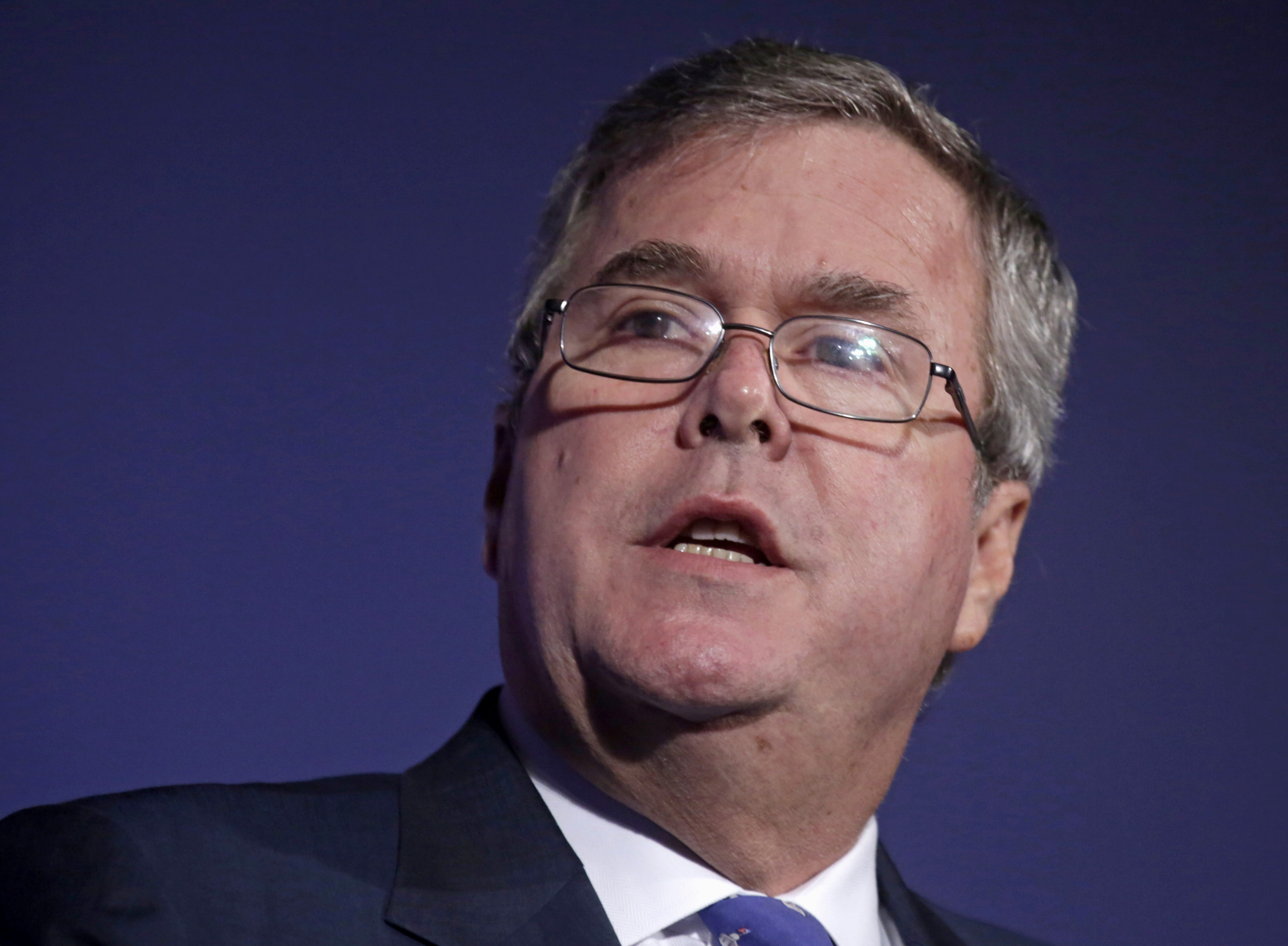 FILE - In this Aug. 9, 2013 file photo, former Florida Gov. Jeb Bush speaks in Chicago. For almost a year, The Associated Press has been tracking movements and machinations of more than a dozen prospective presidential candidates. Bush's standard disclaimer, "I can honestly tell you that I don't know what I'm going to do." He says hell decide by end of year whether to run. One factor in his decision: Whether he can run an optimistic campaign and avoid the mud fight of politics. (AP Photo/M. Spencer Green, File) (AP)