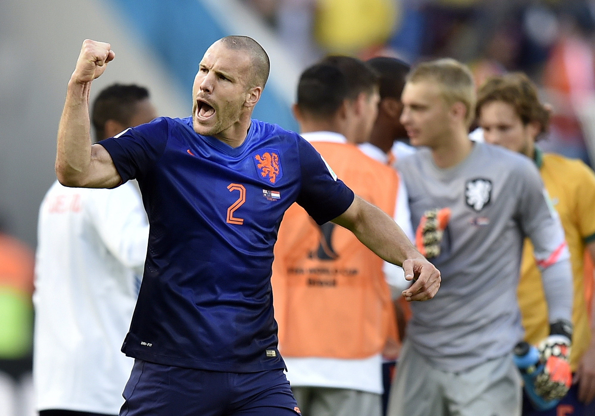 Netherlands' Ron Vlaar celebrates after the group B World Cup soccer match between Australia and the Netherlands at the Estadio Beira-Rio in Porto Alegre, Brazil, Wednesday, June 18, 2014.  The Netherlands won the match 3-2.    (AP Photo/Martin Meissner) (Martin Meissner)