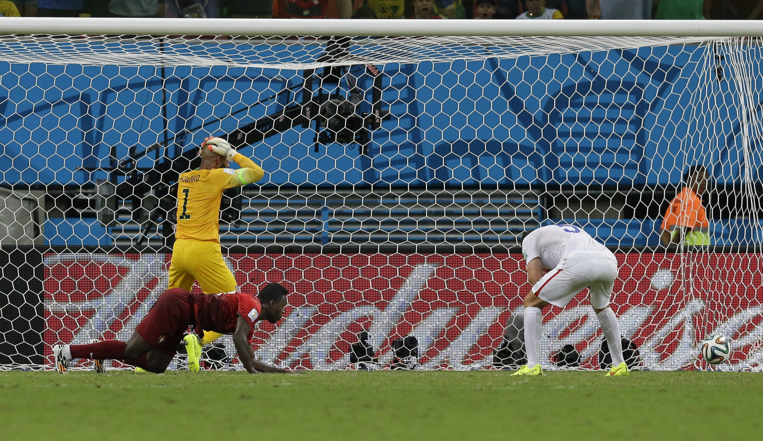 United States' goalkeeper Tim Howard reacts as Portugal's Silvestre Varela's header scores his side's second goal and tie the game 2-2. (AP/Martin Mejia)