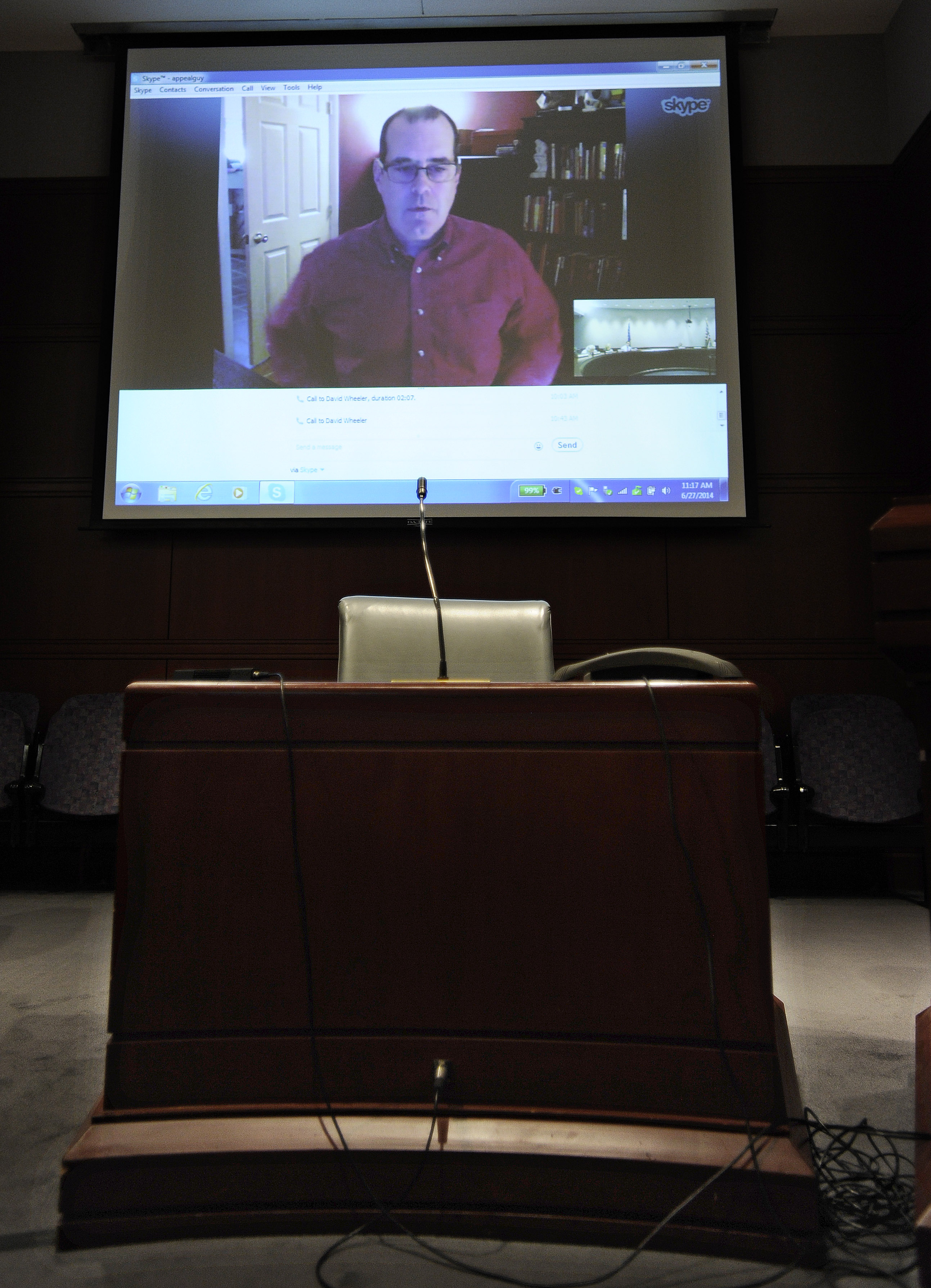 David Wheeler, father of Sandy Hook School shooting victim Benjamin Wheeler, addresses the Sandy Hook Advisory Commission via Skype at the Legislative Office Building, Friday, June 27, 2014, in Hartford, Conn. The Sandy Hook Advisory Commission has been reviewing current policies and making recommendations to Gov. Dannel P. Malloy on school safety, mental health and gun violence prevention. (AP Photo/Jessica Hill) (AP)