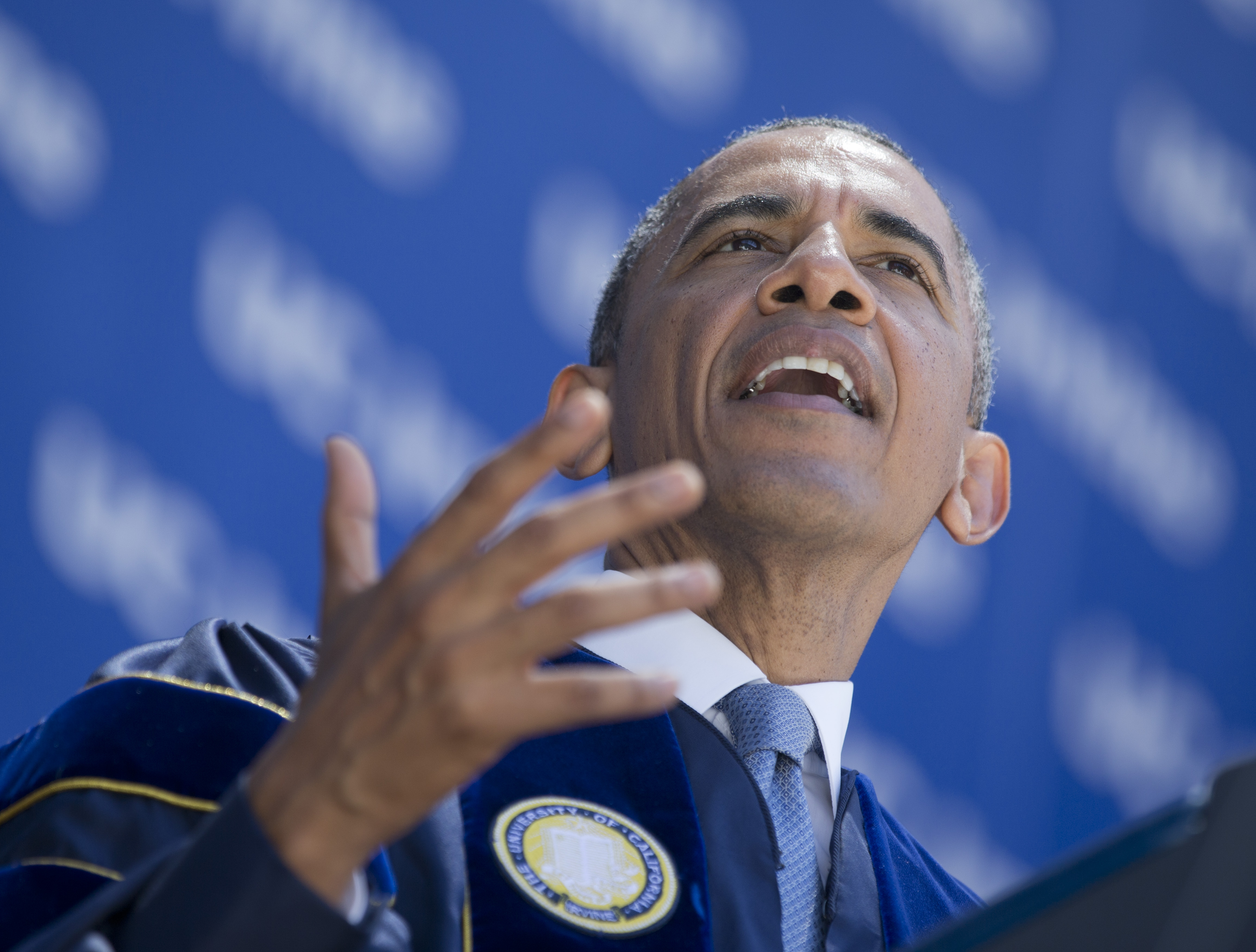 President Barack Obama addresses the graduating class of the University of California, Irvine, at Angel Stadium in Anaheim, Calif., Saturday, June 14, 2014. (AP Photo/Manuel Balce Ceneta)