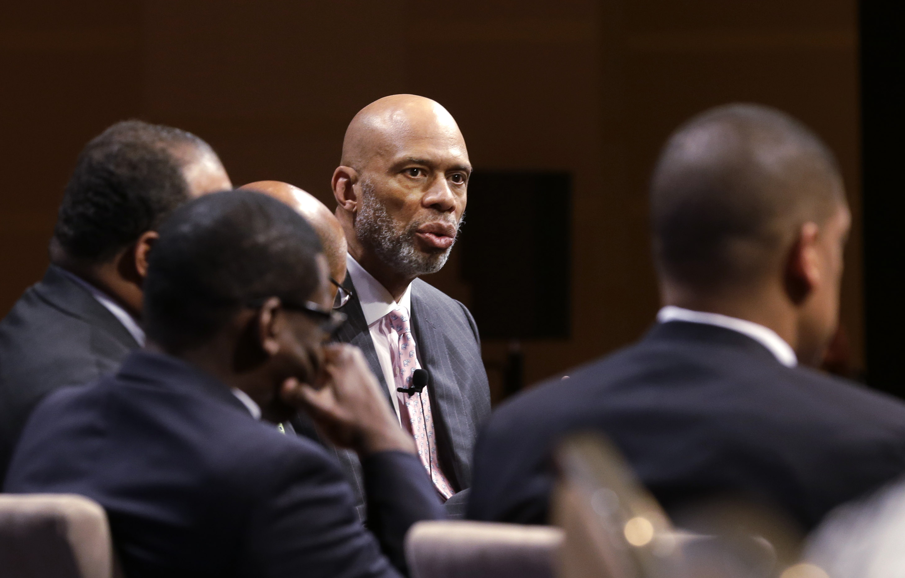 Former NBA basketball player Kareem Abdul-Jabbar speaks during a panel discussion on race and sports, at the U.S. Conference of Mayors meeting Monday, June 23, 2014, in Dallas. (AP/LM Otero)