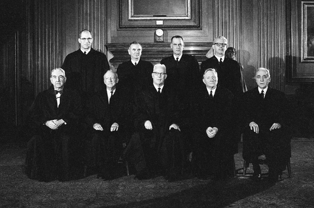 Chief Justice Earl Warren and the eight associate justices of the Supreme Court, Nov. 19, 1962. (AP)