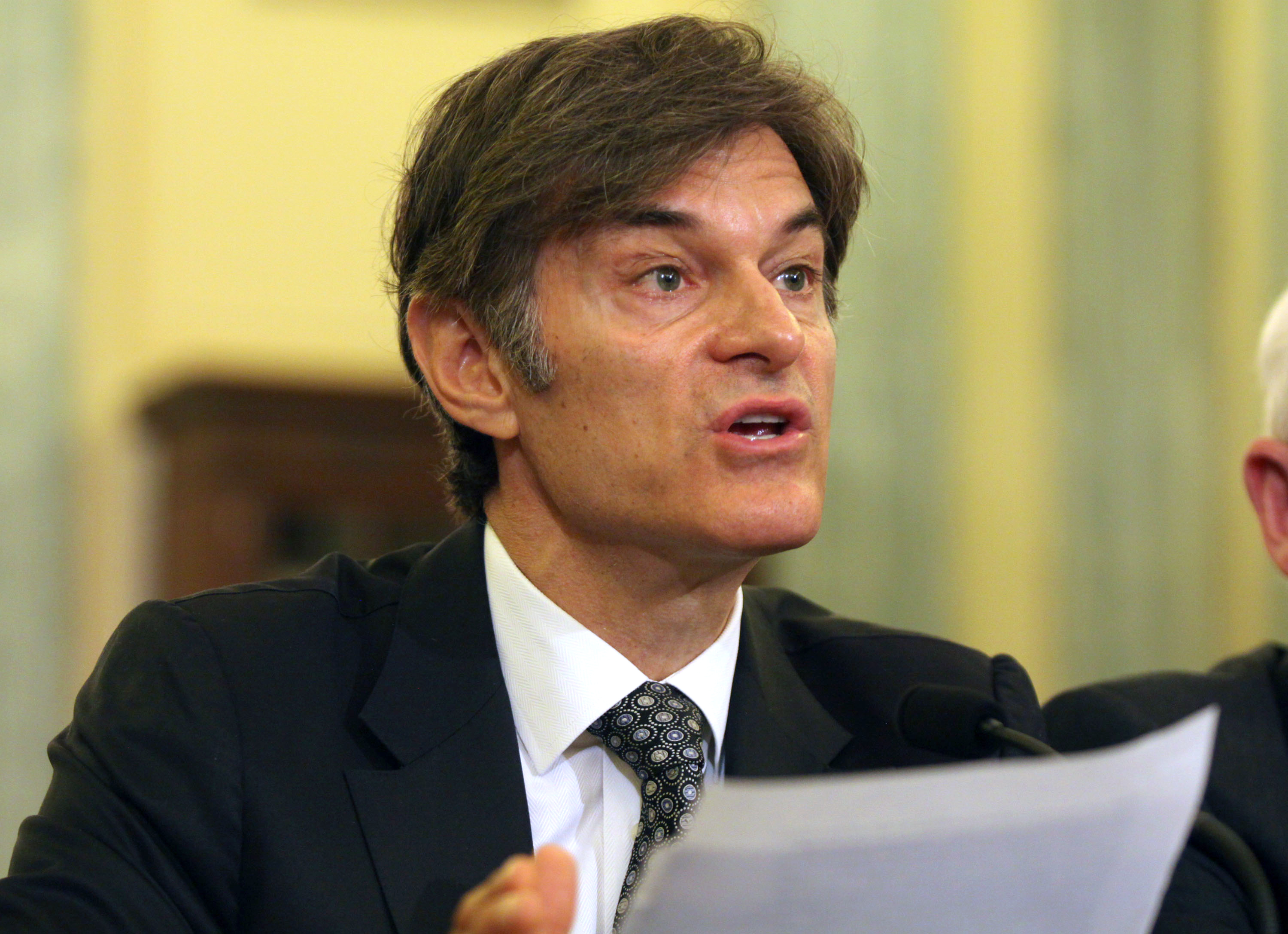 Dr. Mehmet C. Oz, chairman and Professor of Surgery, Columbia University College of Physicians and Surgeons, testifies on Capitol Hill in Washington, Tuesday, June 17, 2014 , before the Senate subcommittee on Consumer Protection, Product Safety, and Insurance hearing to examine protecting consumers from false and deceptive advertising of weight-loss products.  (AP Photo/Lauren Victoria Burke) (AP)