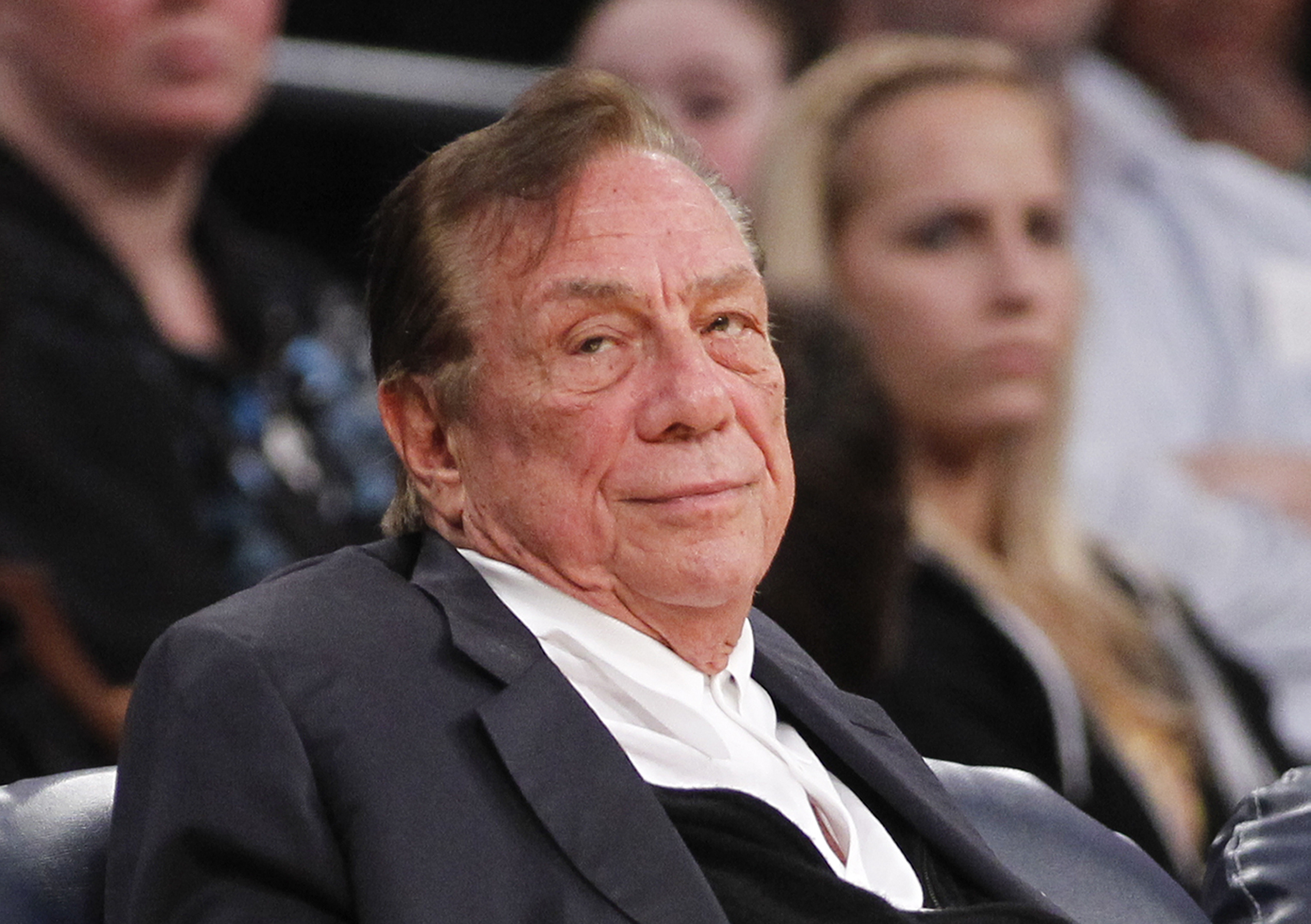 FILE - In this Dec. 19, 2011 file photo, Los Angeles Clippers owner Donald Sterling watches the Clippers play the Los Angeles Lakers during an NBA preseason basketball game in Los Angeles. The future of the Clippers is closer to decision as testimony resumes Monday, July 21, 2014,  in a probate trial over whether a deal negotiated by Donald Sterling's estranged wife to sell the team for $2 billion is authorized under a Sterling family trust.  (AP Photo/Danny Moloshok, File) (AP)