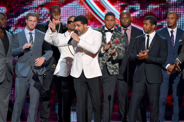 Drake, center, and the Seattle Seahawks at the ESPY Awards at the Nokia Theatre, July 16, 2014, in Los Angeles. (AP/John Shearer)