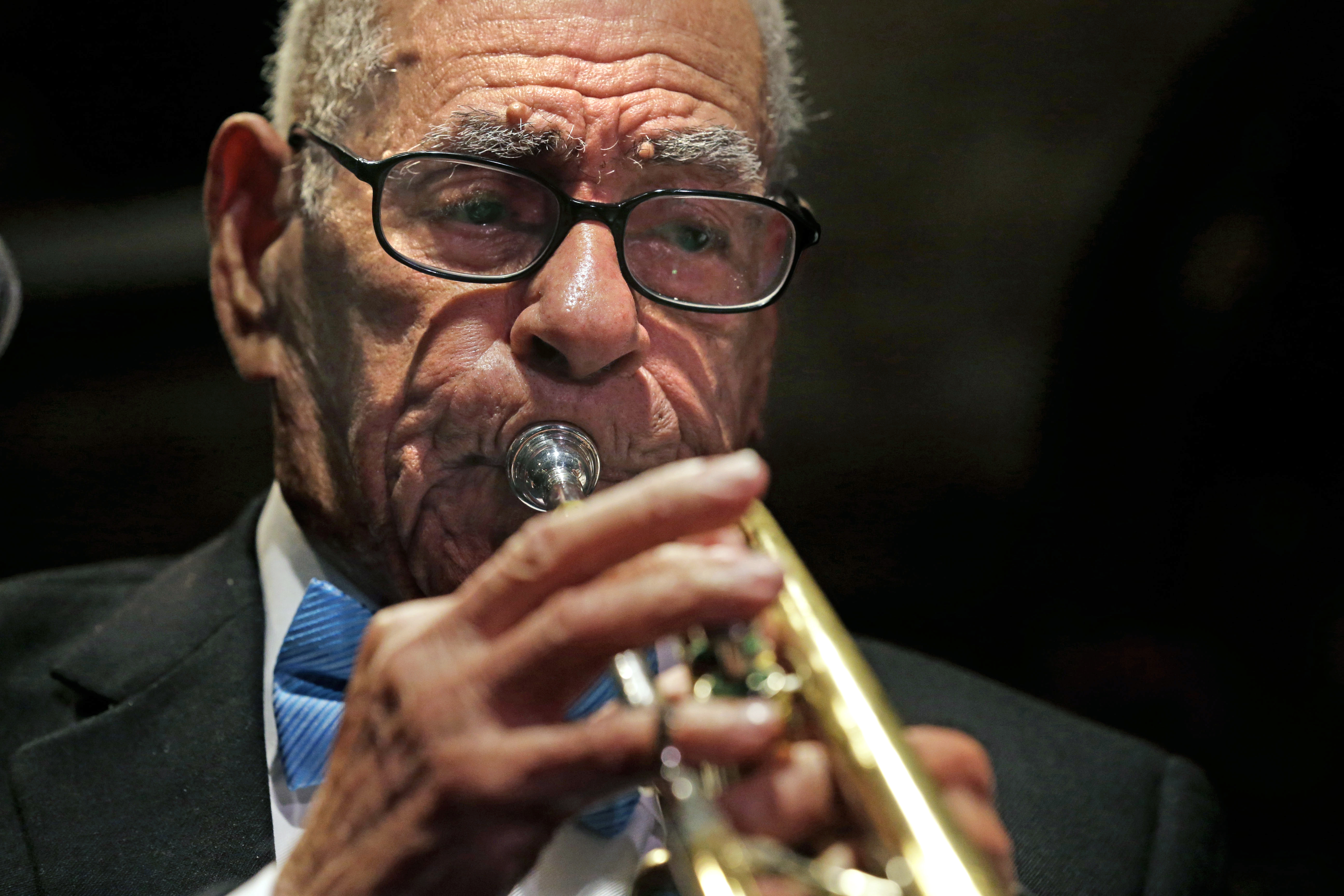 FILE - In a Wednesday, July 17, 2013 file photo, Dixieland jazz musician Lionel Ferbos performs at his 102nd birthday party at the Palm Court Jazz Cafe in New Orleans. Lionel Ferbos died Saturday, July 19, 2014, at his home in New Orleans, according to a family friend. He was 103. (AP Photo/Gerald Herbert) (AP)