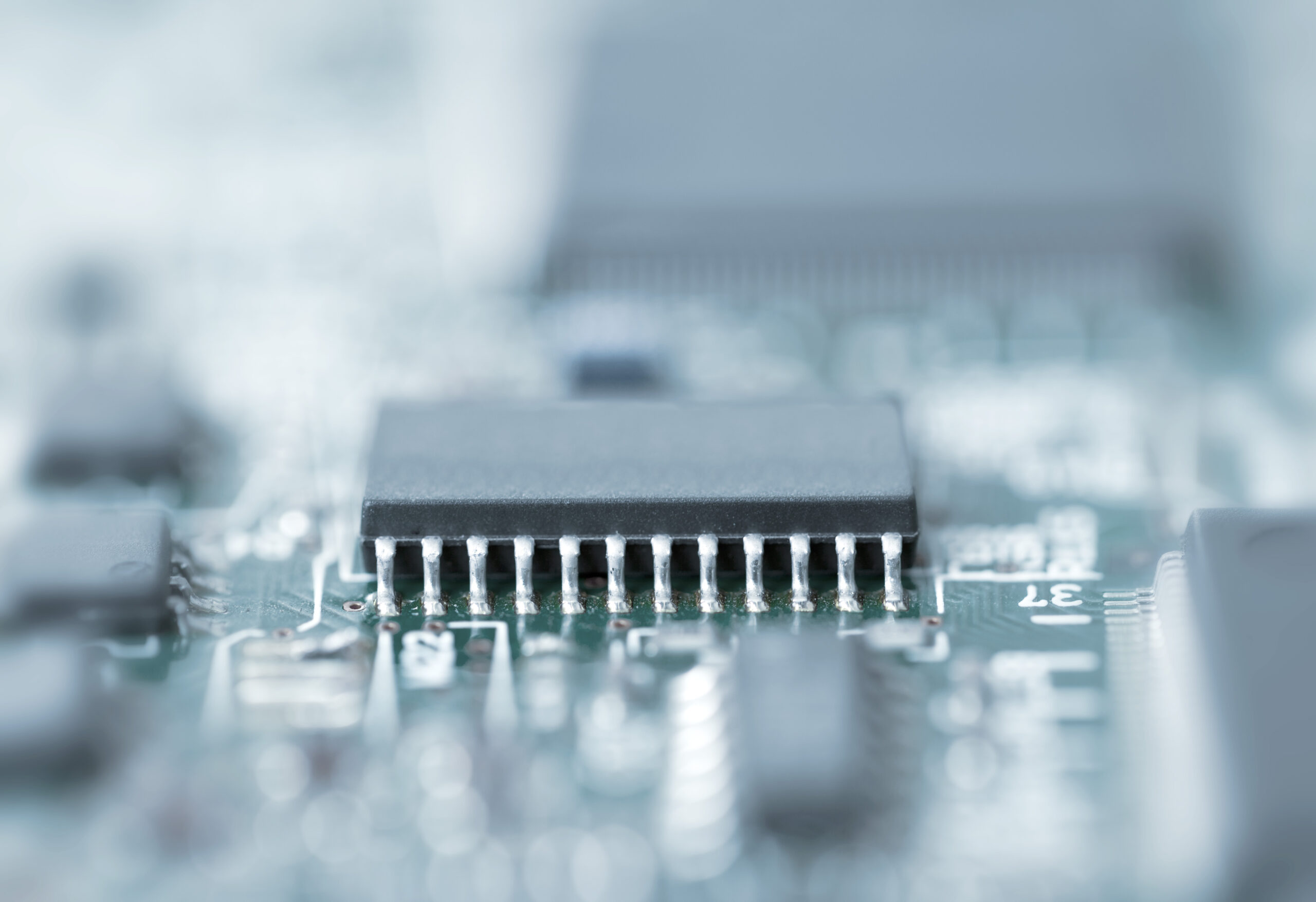 Blue toned close up microchip shot with shallow depth of field (Shawn Hempel/Shutterstock)