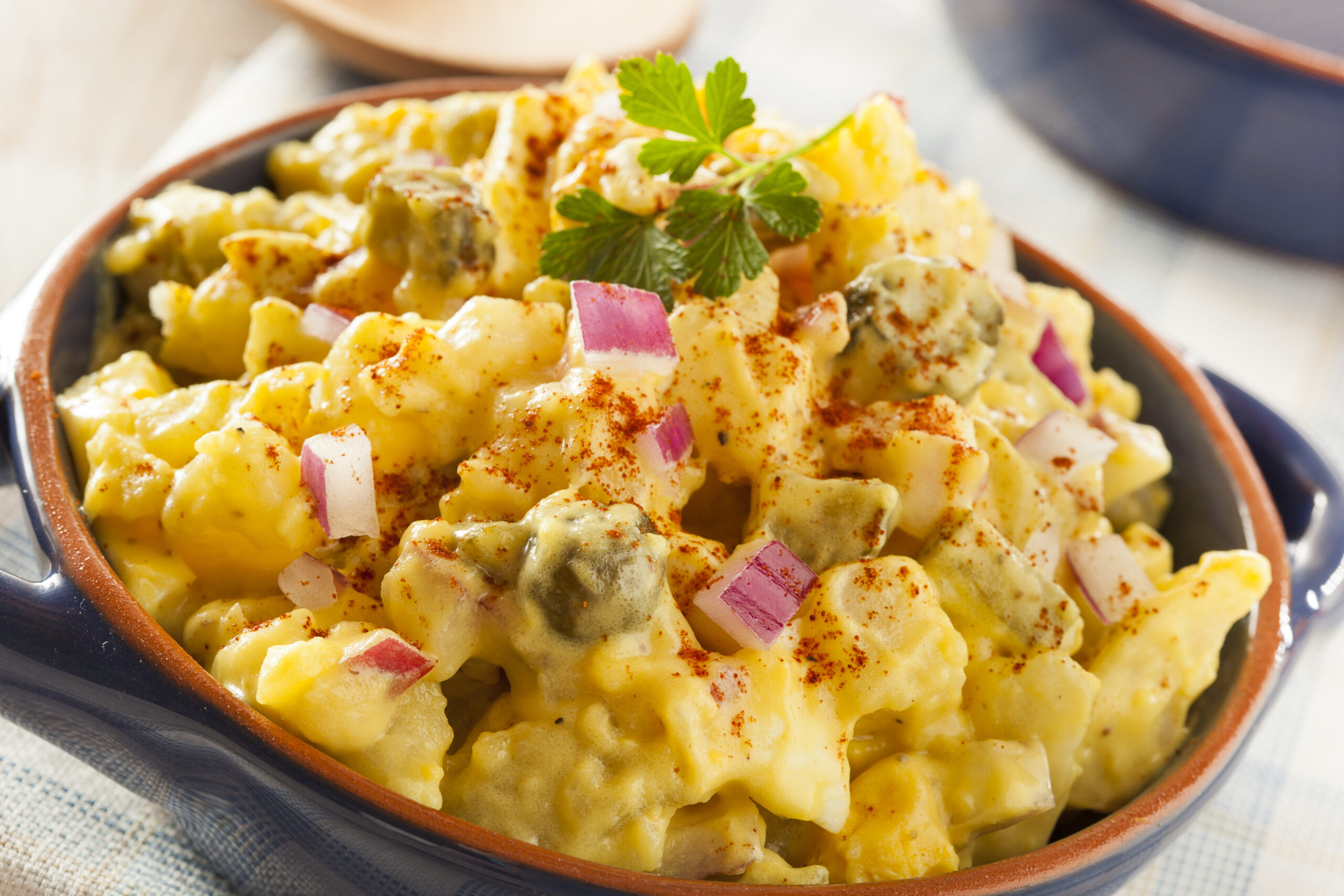 Yellow potato salad with eggs and pickles (Brent Hofacker/Shutterstock)
