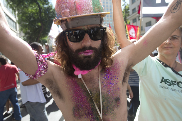 A World Cup protester in Rio de Janeiro, Brazil, June 12, 2014. (AP/Silvia Izquierdo)