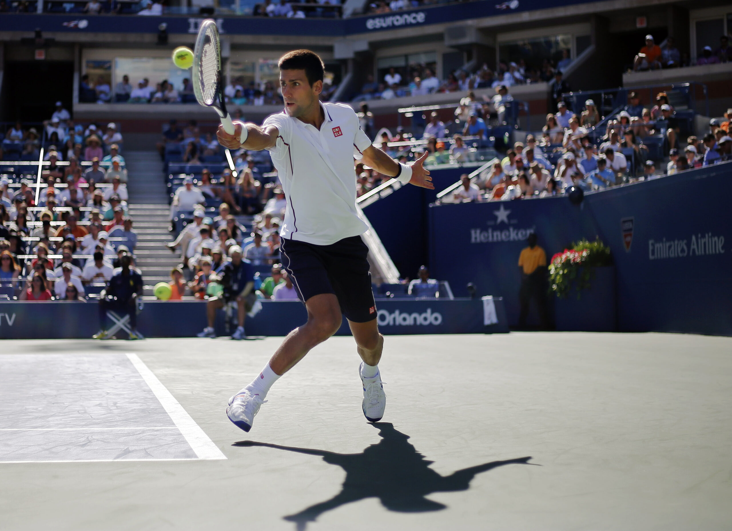 Novak Djokovic, of Serbia, returns a shot against Paul-Henri Mathieu, of France, during the second round of the 2014 U.S. Open tennis tournament, Thursday, Aug. 28, 2014, in New York. (AP Photo/Elise Amendola) (Elise Amendola)