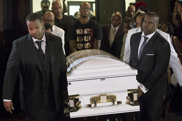 Pallbearers carry the casket of Eric Garner at Bethel Baptist Church following his funeral service, July 23, 2014, in Brooklyn, N.Y. (AP/John Minchillo)