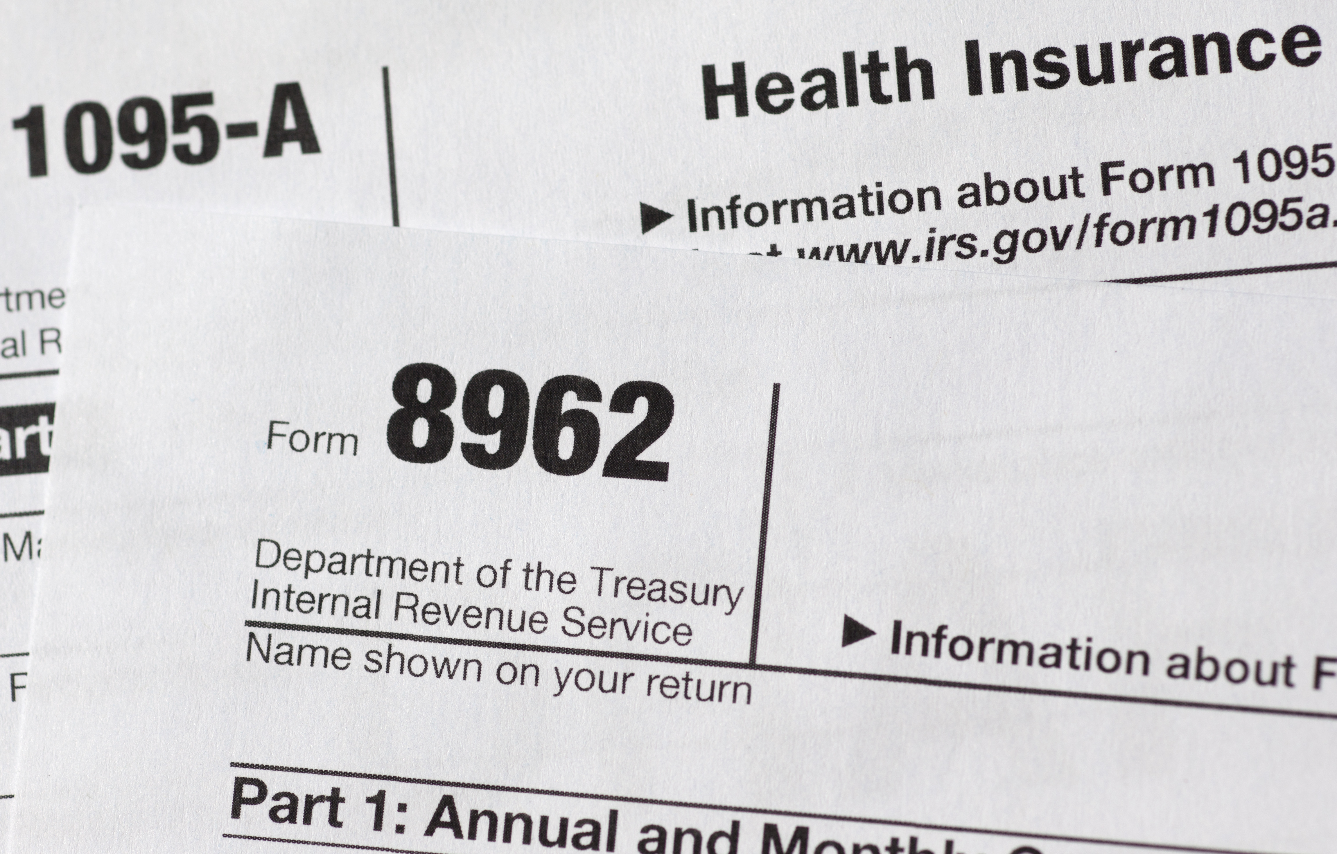 This Aug. 21, 2014, photo shows health care tax forms 8962 and1095-A, in Washington. Who thinks about taxes around Labor Day?  If you value your tax refund and youre one of millions getting a health insurance tax credit under President Barack Obamas health care law, its not too early. If you worked a lot of overtime, or maybe your spouse got a higher-paying job, arcane connections between the health law and taxes can reduce or even eliminate your refund. (AP Photo/Carolyn Kaster) (AP)