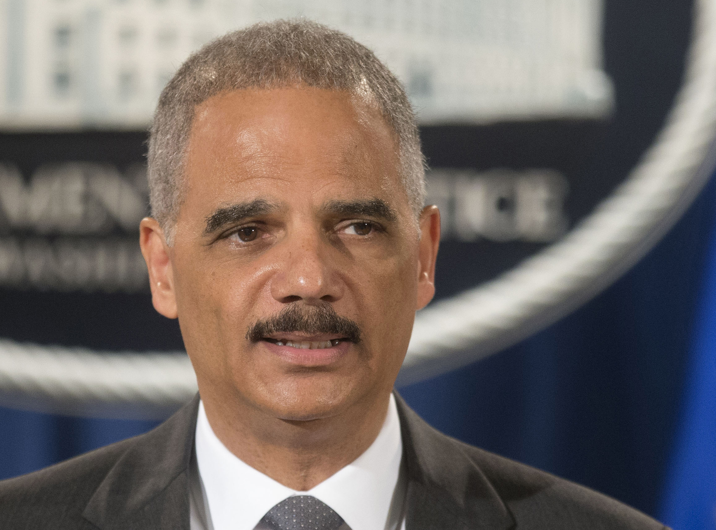 FILE - This July 14, 2014 file photo shows Attorney General Eric Holder speaking at the Justice Department in Washington. Holder said Thursday he's concerned about police use of military equipment in Ferguson, Mo. (AP/Pablo Martinez Monsivais)