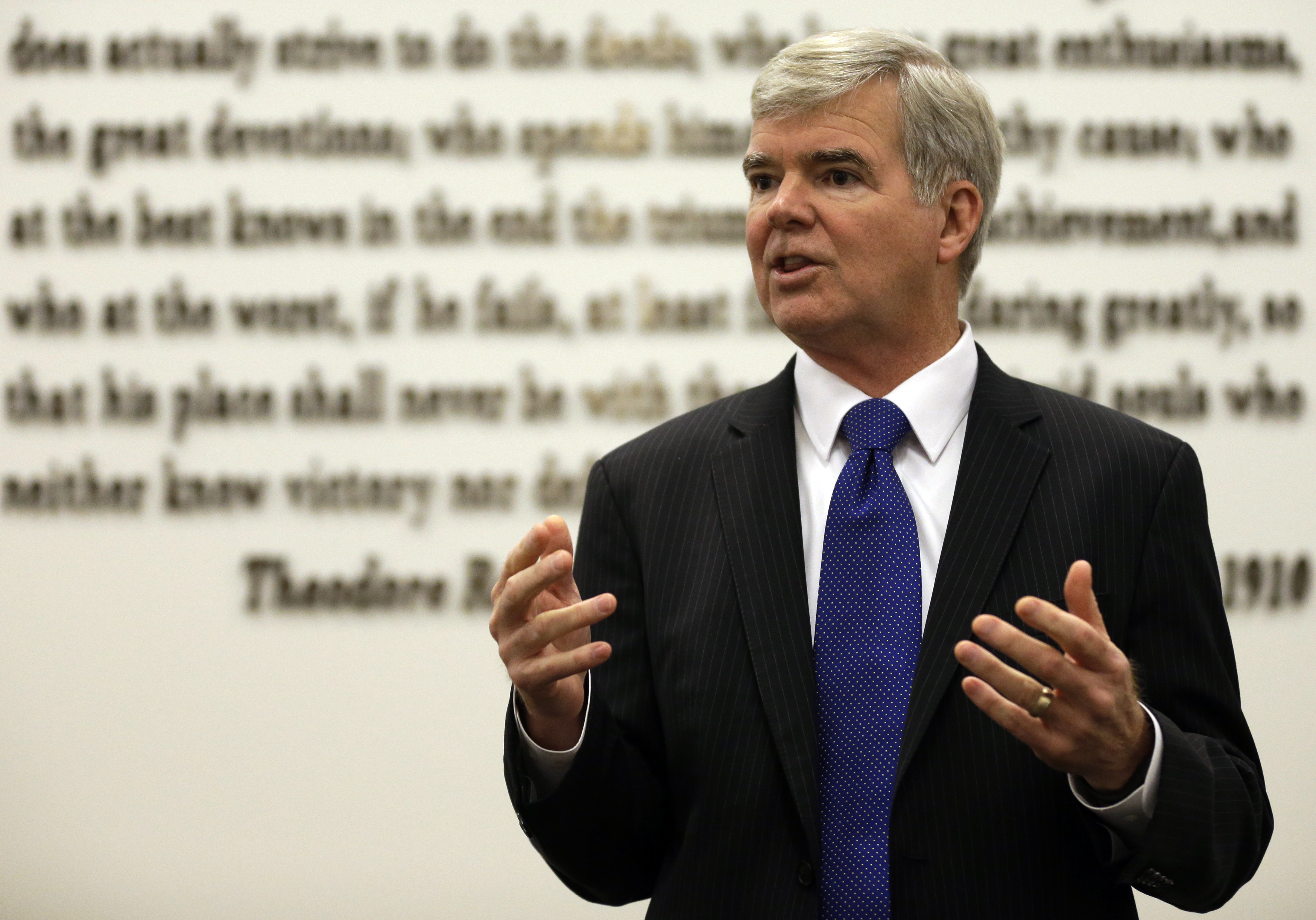 NCAA President Mark Emmert gestures while speaking at NCAA headquarters in Indianapolis, Thursday, Aug. 7, 2014. The NCAA Board of Directors overwhelmingly approved a package of historic reforms Thursday that will give the nation's five biggest conferences the ability to unilaterally change some of the basic rules governing college sports. (AP Photo/Michael Conroy) (AP)