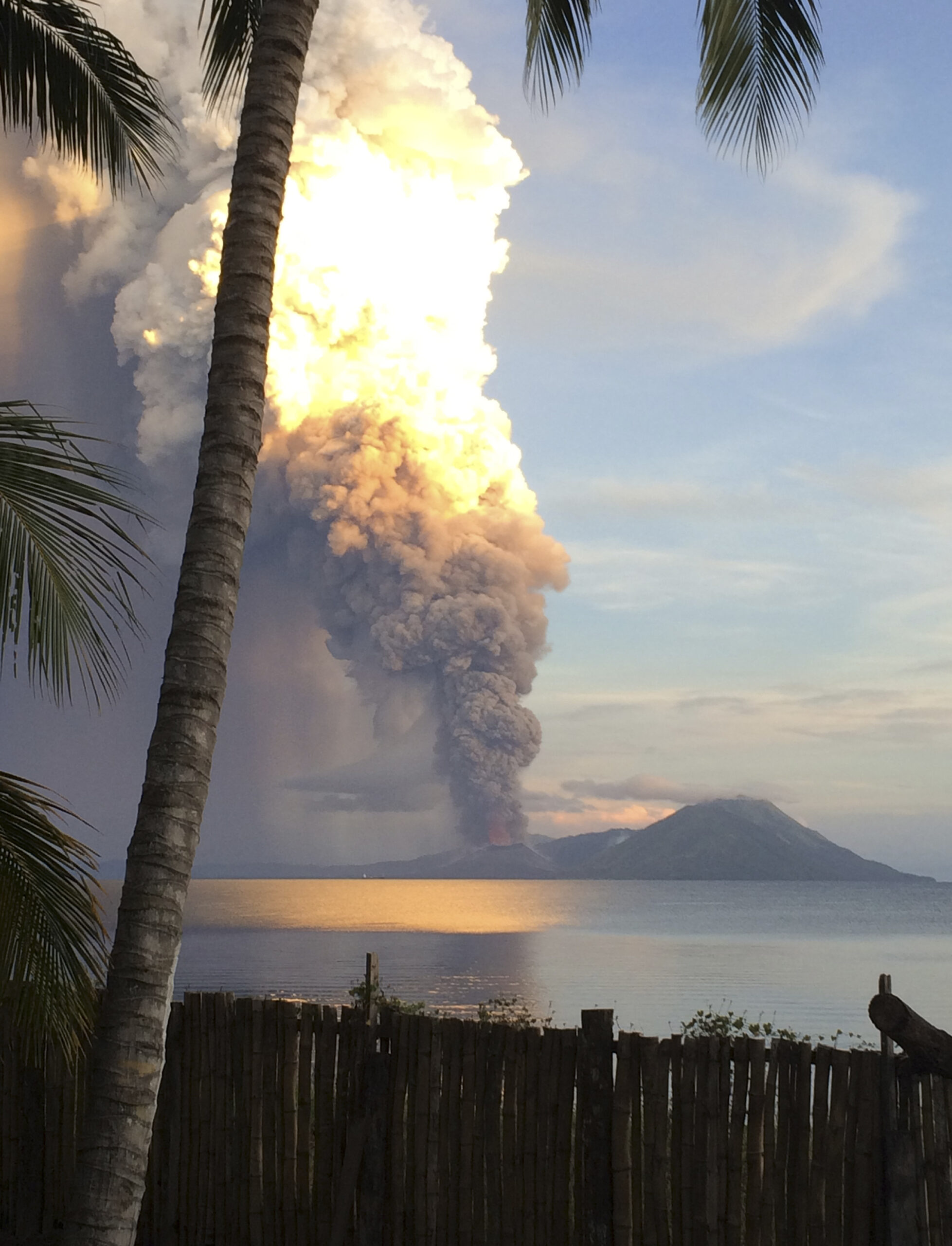 Smoke billows from Mt. Tavurvu after an eruption in Kokopo, east New Britain, Papua New Guinea, Friday, Aug. 29, 2014. (AP Photo/Jason Tassell)