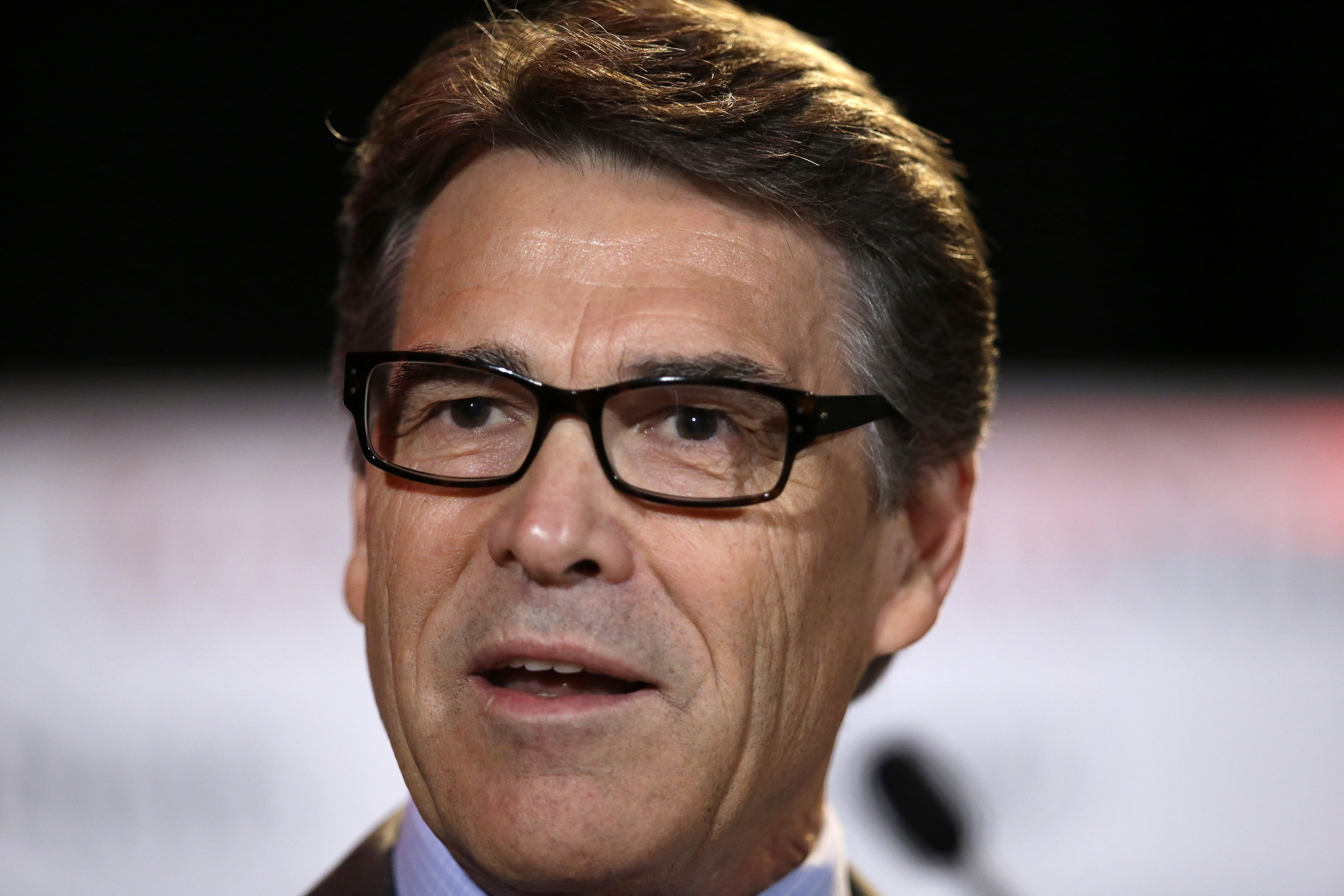 FILE - In this Friday, Aug. 8, 2014, file photo, Texas Gov. Rick Perry delivers a speech to nearly 300 in attendance at the 2014 RedState Gathering, in Fort Worth, Texas. Perry was indicted on Friday, Aug. 15, 2014, for abuse of power after carrying out a threat to veto funding for state public corruption prosecutors. (AP Photo/Tony Gutierrez, File) (AP)