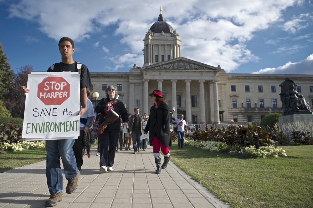 Daemon Bath leads a march departing the Manitoba Legislative Building marking the first anniversary of Occupy Wall Street on September 17, 2012 in Winnipeg. (Nic Neufeld/Shutterstock)