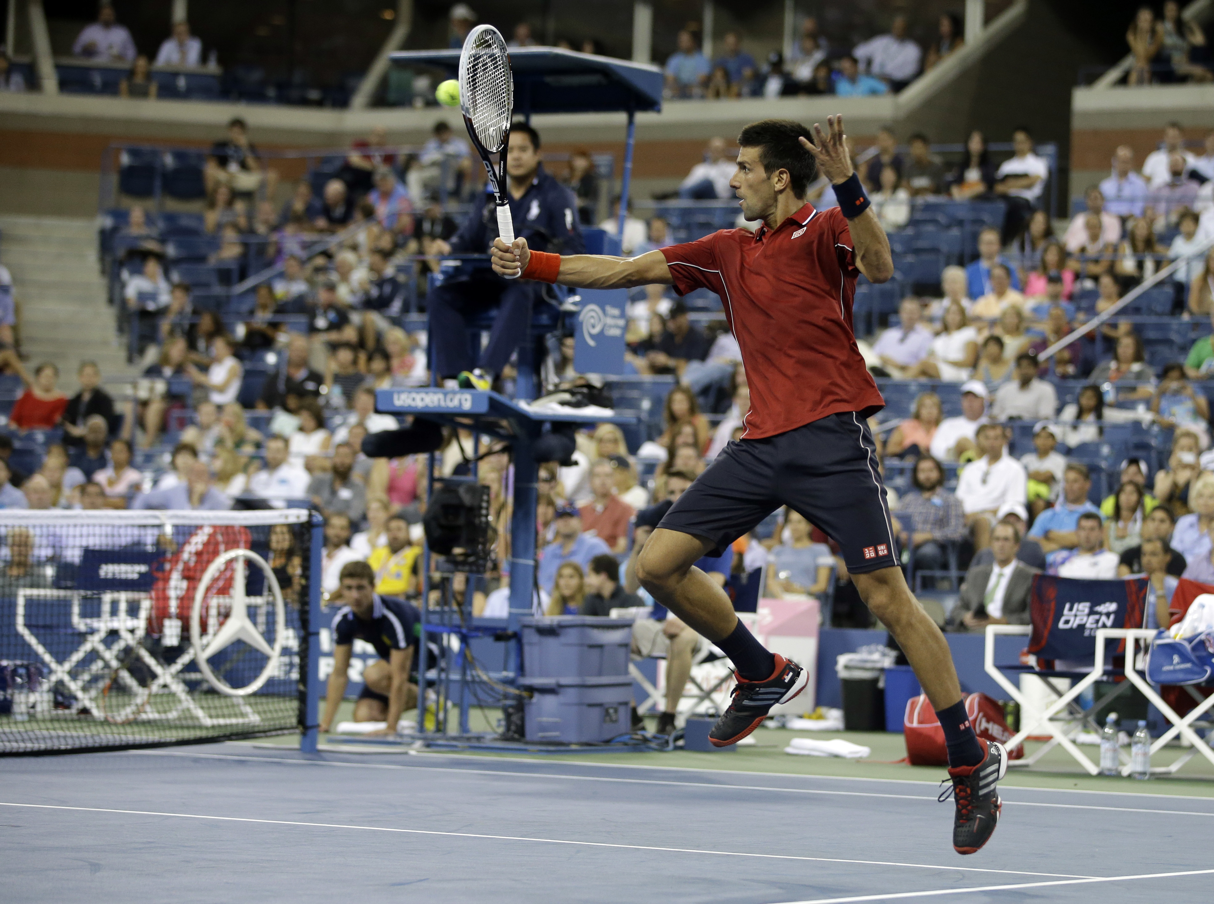 Novak Djokovic, of Serbia, returns a shot to Diego Schwartzman, of Argentina, during the opening round of the U.S. Open tennis tournament Monday, Aug. 25, 2014, in New York. (AP Photo/Darron Cummings) (AP)