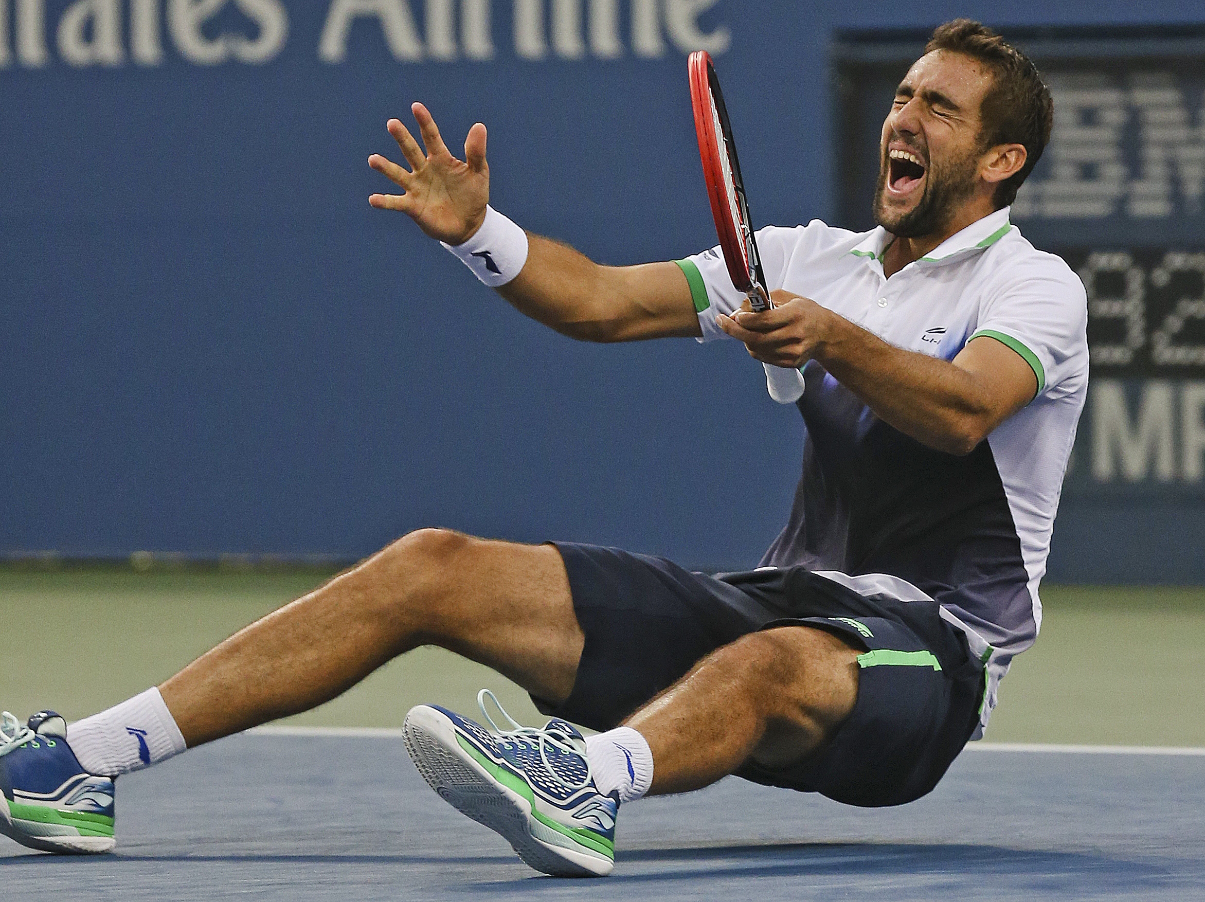 Marin Cilic, of Croatia, reacts after defeating Kei Nishikori, of Japan, during the championship match of the 2014 U.S. Open tennis tournament, Monday, Sept. 8, 2014, in New York. (AP Photo/Mike Groll) (Mike Groll)
