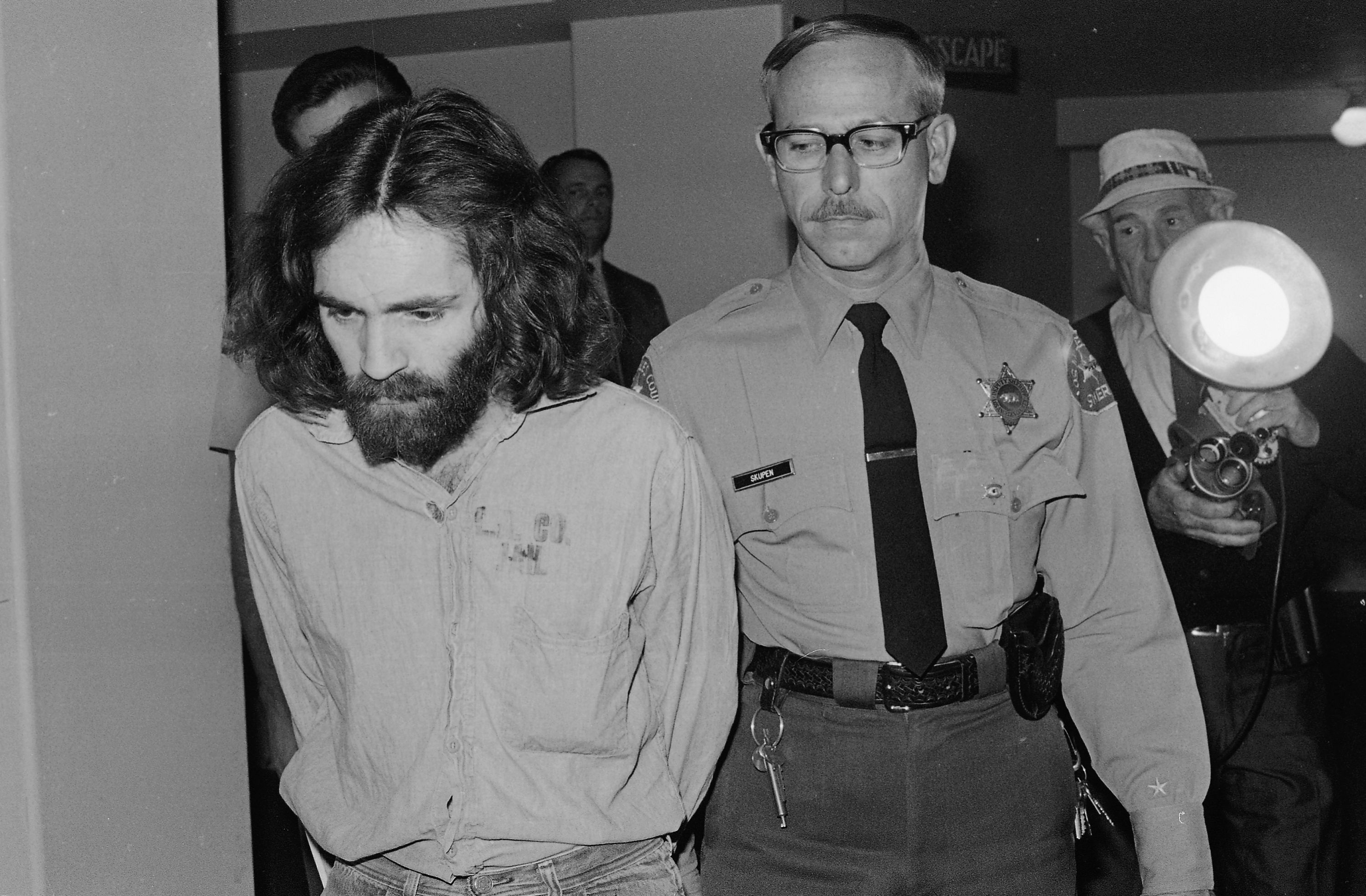 Charles Manson being led to a Los Angeles court room (AP/Wally Fong)