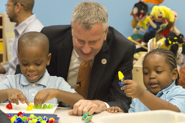 Bill de Blasio visits the Inner Force Early Tots Childhood Learning Center, Brooklyn NY, Sept. 4, 2014. (AP/Theodore Parisienne)