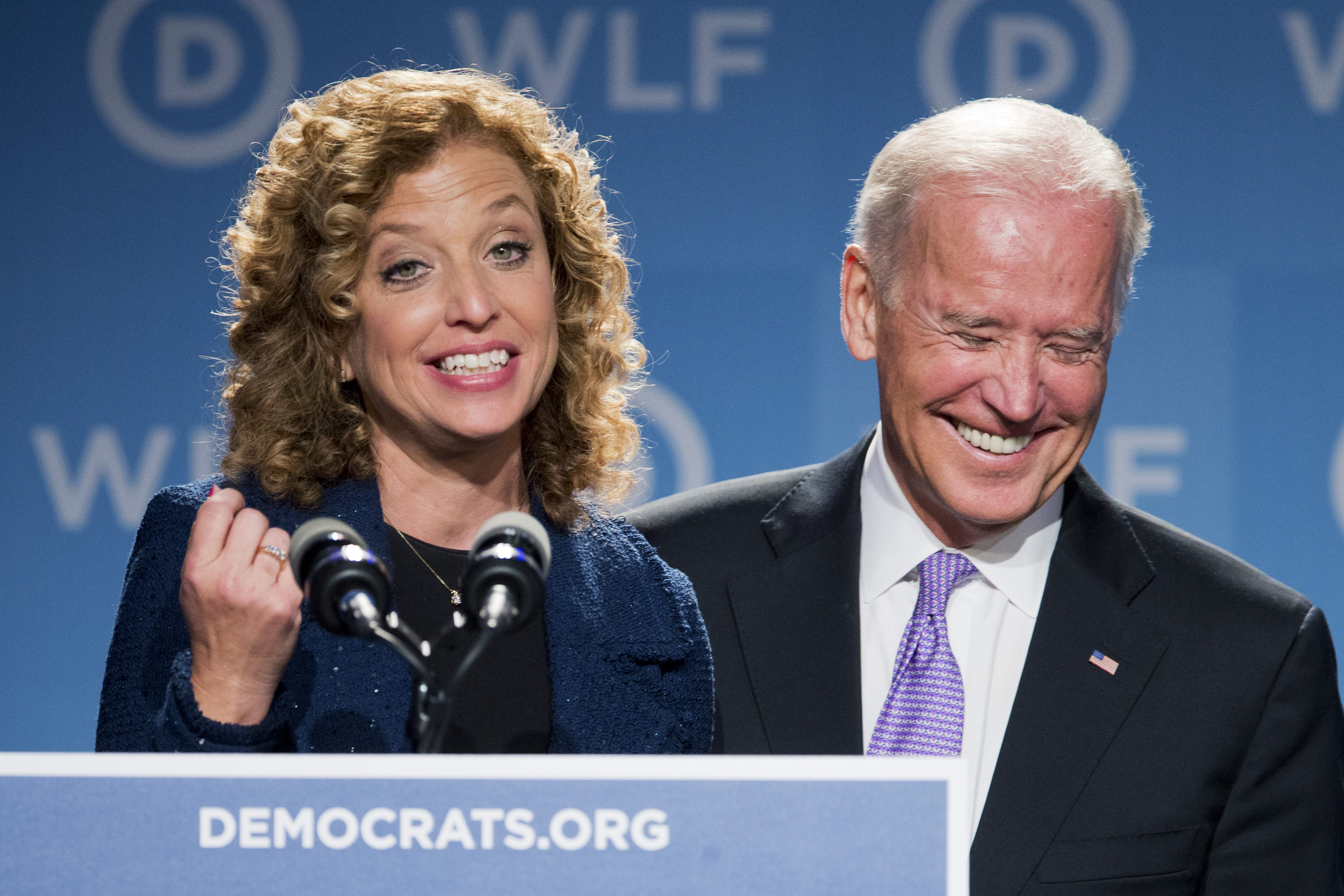 Vice President Joe Biden, right, laughs as he is introduced by DNC Chair Rep. Debbie Wasserman Schultz, D-Fla., at the DNC Women's Leadership conference in Washington, Friday, Sept. 19, 2014. (AP Photo/Manuel Balce Ceneta) (AP)