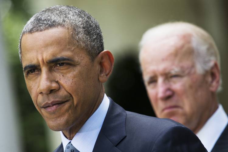 President Barack Obama, accompanied by Vice President Joe Biden (AP Photo/Jacquelyn Martin)