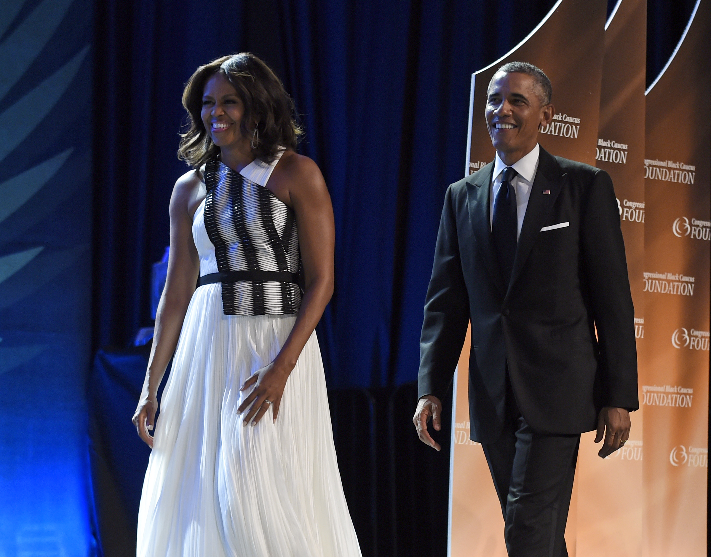 President Barack Obama and first lady Michelle Obama arrive at the Congressional Black Caucus Foundations 44th Annual Legislative Conference Phoenix Awards Dinner in Washington, Saturday, Sept. 27, 2014. (AP Photo/Susan Walsh) (AP)