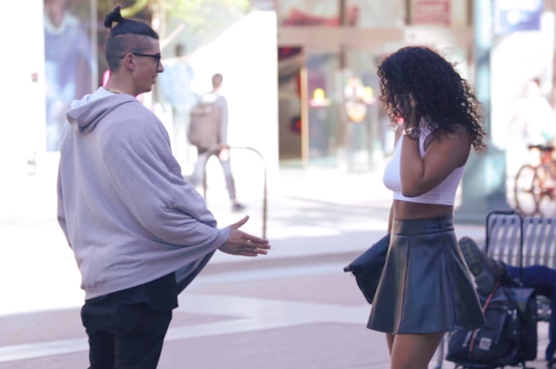 A still from "Fake Hand Ass Pinch Prank" (YouTube/Sam)