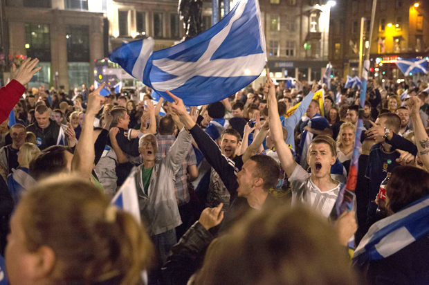 Supporters of the Yes campaign in the Scottish independence referendum in George Square, Glasgow, Scotland, Sept. 18, 2014. (AP/Matt Dunham)