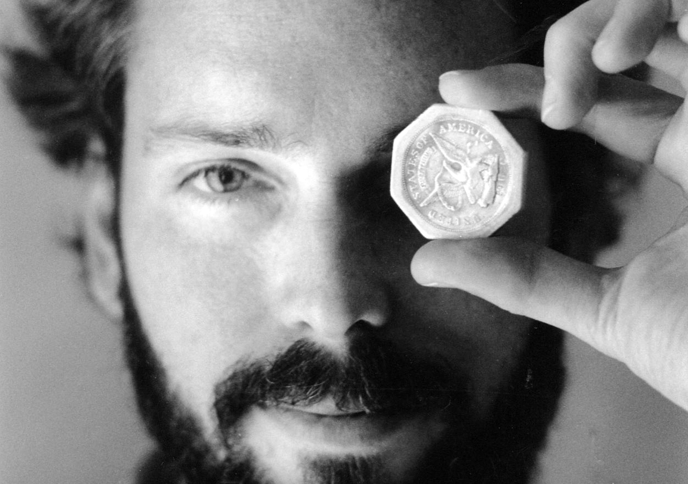 In this November 1989 photo, Tommy Thompson holds a $ 50 pioneer gold piece retrieved earlier in 1989 from the wreck of the gold ship Central America. Thompson led a group that recovered millions of dollars worth of sunken treasure only to end up involved in court cases brought by dozens of insurance companies laying claim to the treasure. (AP Photo/The Columbus Dispatch, Lon Horwedel) (AP)