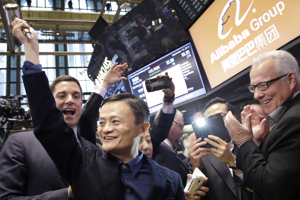 Jack Ma, founder of Alibaba, raises a ceremonial mallet during the company's IPO at the New York Stock Exchange, Sept. 19, 2014. (AP/Mark Lennihan)