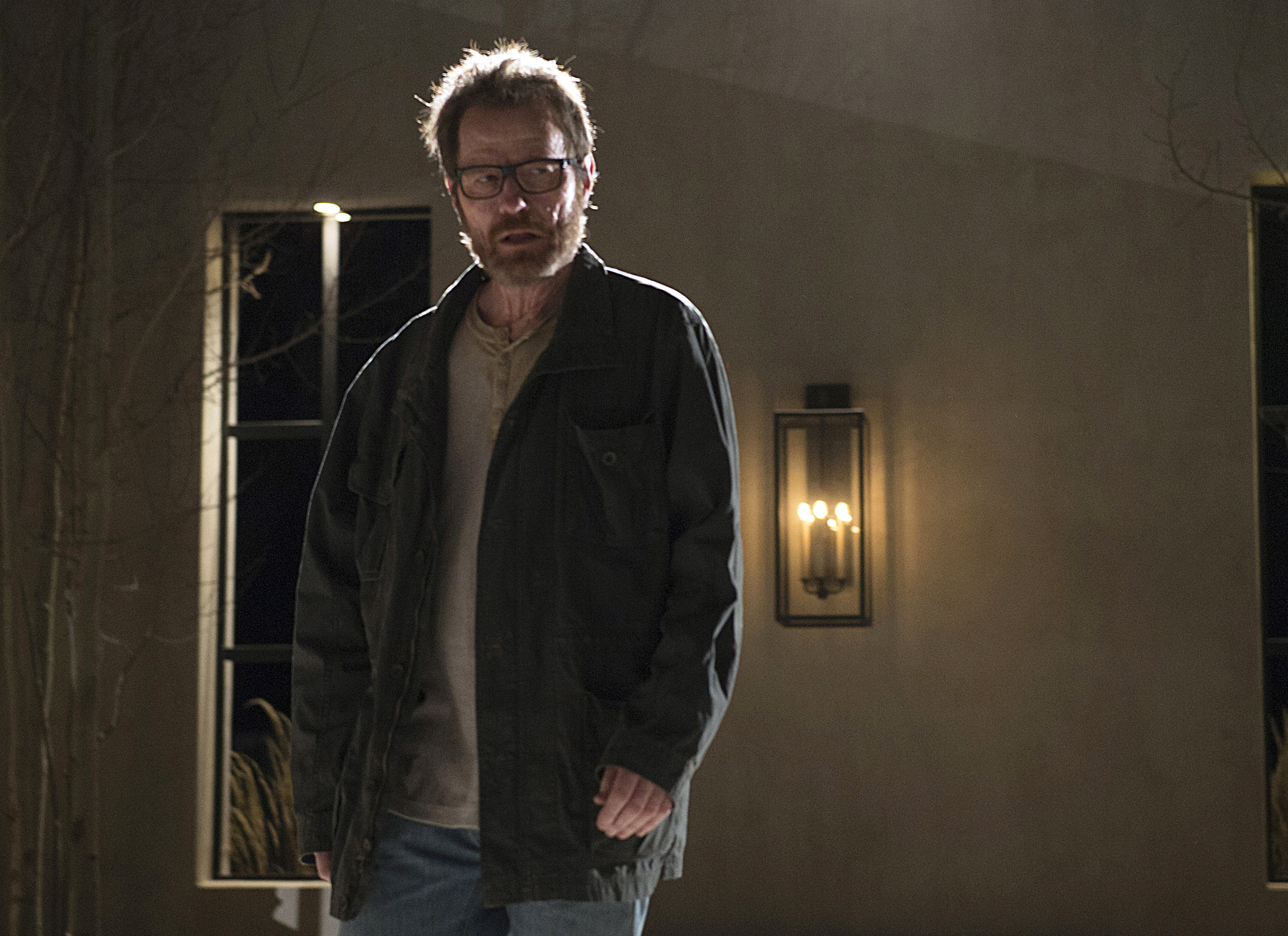 FILE - In this undated file image released by AMC shows Bryan Cranston as Walter White in a scene from the series finale of "Breaking Bad".  Toys R Us is pulling its four collectible dolls based on characters from AMC's hit series "Breaking Bad" after taking heat from a Florida mom who launched a petition campaign. The dolls are based on the series about Walter White, a high school chemistry teacher who turns into a crystal meth dealer, and his sidekick Jesse Pinkman. The figures have a detachable bag of cash and a bag of methamphetamines. Toys R Us, which is based in Wayne, New Jersey, told The Associated Press late Tuesday, Oct. 21, 2014, that the dolls are being removed immediately from its website and shelves. (AP Photo/AMC, Ursula Coyote, File) (AP)