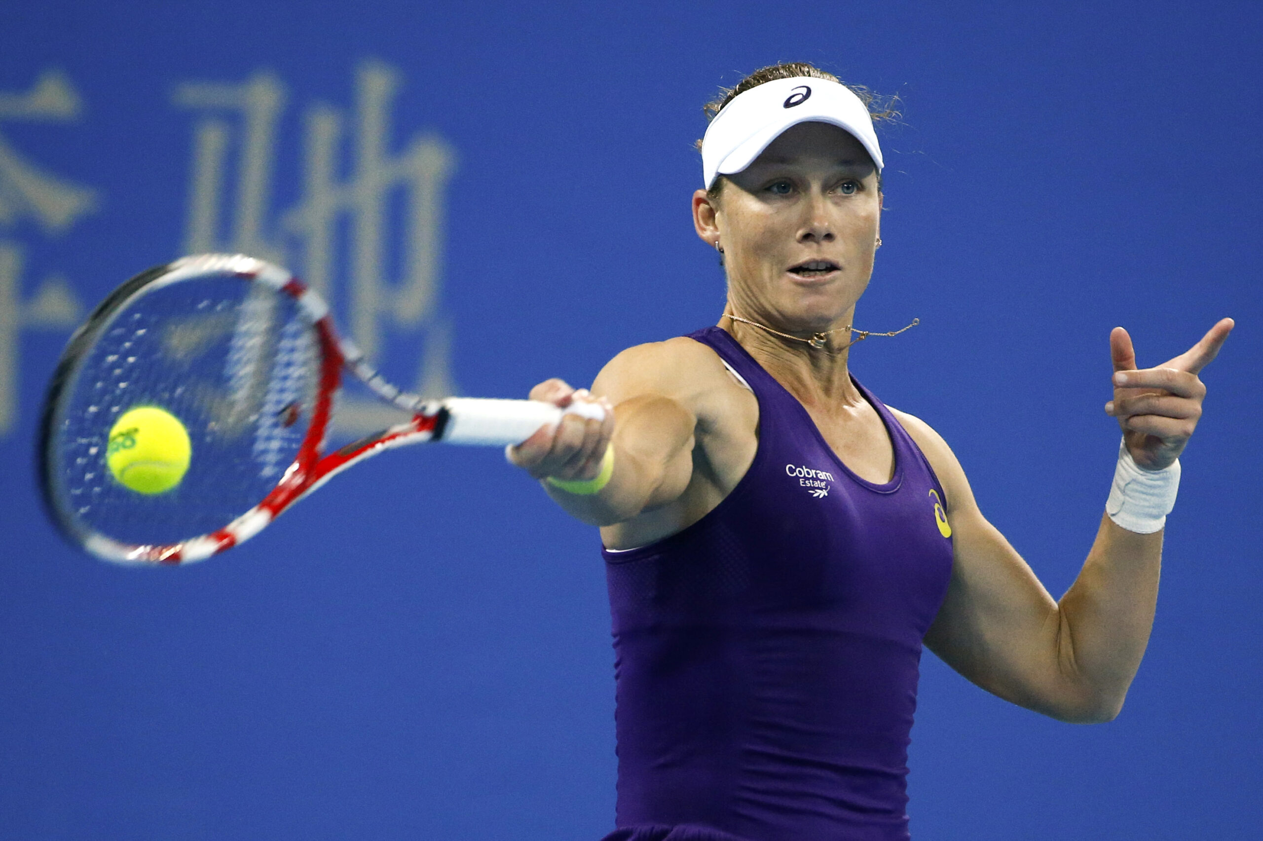 Samantha Stosur from Australia return a shots from  Caroline Wozniacki of Denmark during the China Open tennis tournament at the National Tennis Stadium in Beijing, China, Wednesday, Oct. 1, 2014. (AP Photo/Vincent Thian) (Vincent Thian)