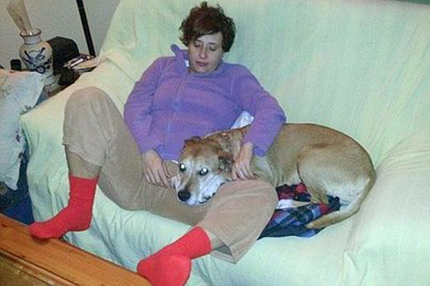 Teresa Romero, the nursing assistant who is infected with Ebola in Madrid, with her dog named Excalibur. (AP)