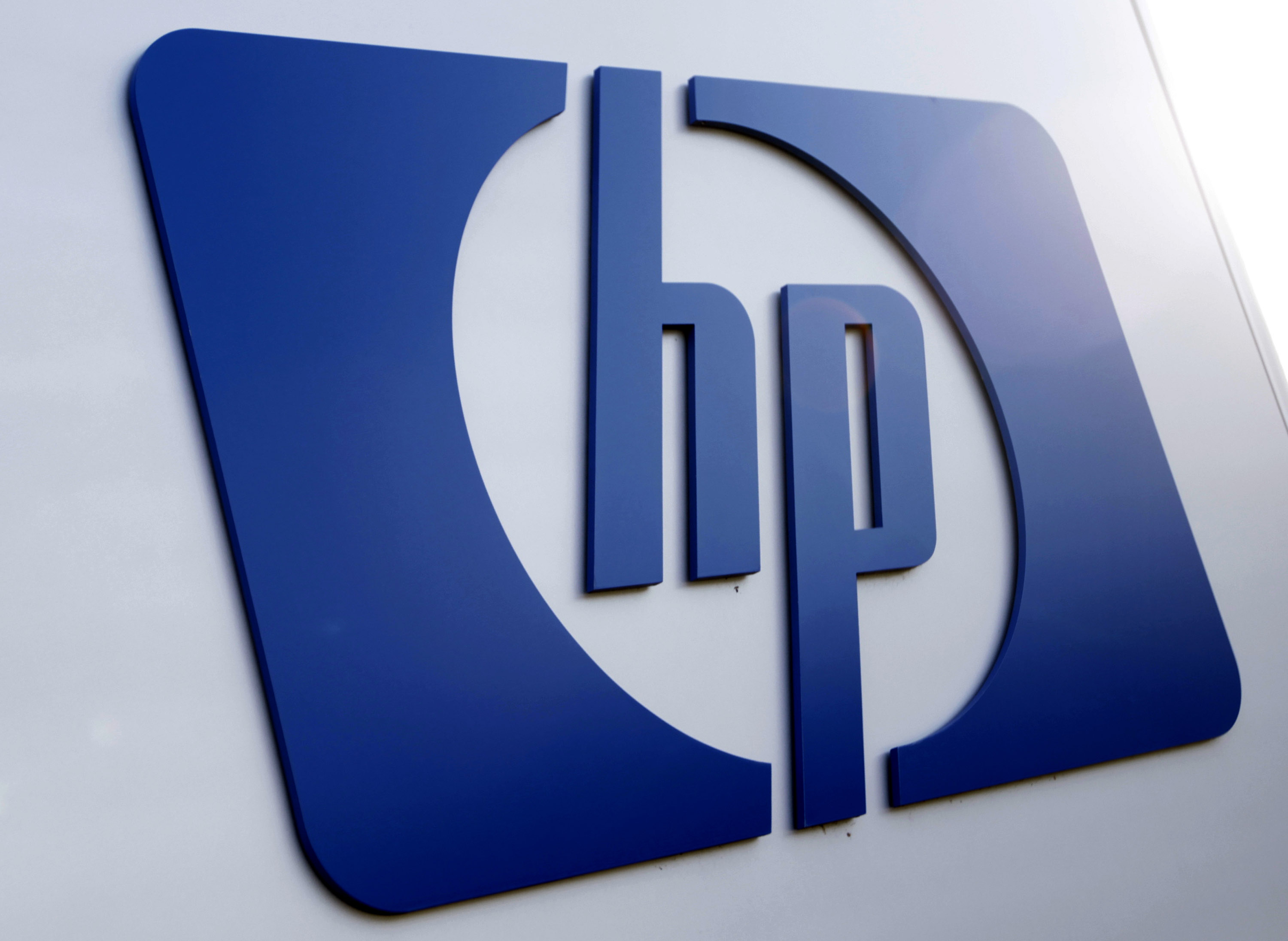 FILE - This Feb 21, 2012 file photo shows a Hewlett Packard logo in Frisco, Texas. Hewlett-Packard on Monday, Oct. 6, 2014 said it is splitting itself into two companies, one focused on its personal computer and printing business and another on technology services, such as data storage, servers and software, as it aims to drive profits higher. (AP Photo/LM Otero, File) (AP)