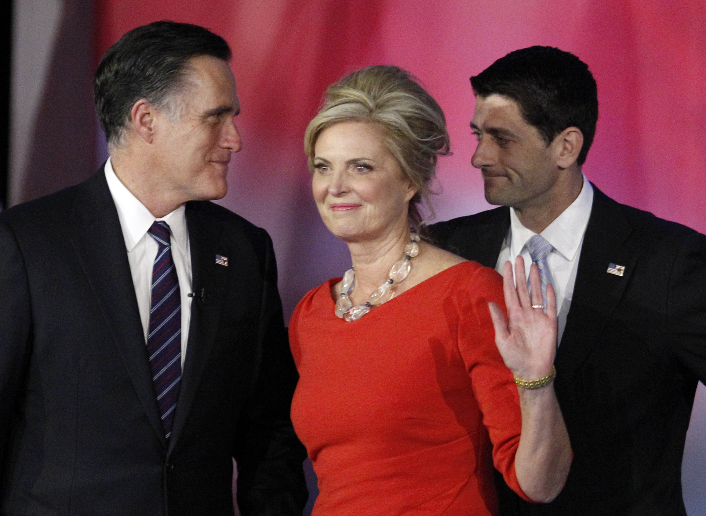 FILE - In this Nov. 7, 2012, file photo, Republican presidential candidate and former Massachusetts Gov. Mitt Romney, left, speaks to his running mate, vice presidential candidate, Rep. Paul Ryan, right, R-Wis., as Romney's wife Ann waves to supporters after Romney conceded the race during his election night rally in Boston. Romney and his wife Ann announce an initiative to accelerate treatment and cures for complex neurological diseases, in partnership with Bostons Brigham and Womens Hospital. (AP Photo/Stephan Savoia, File) (AP)