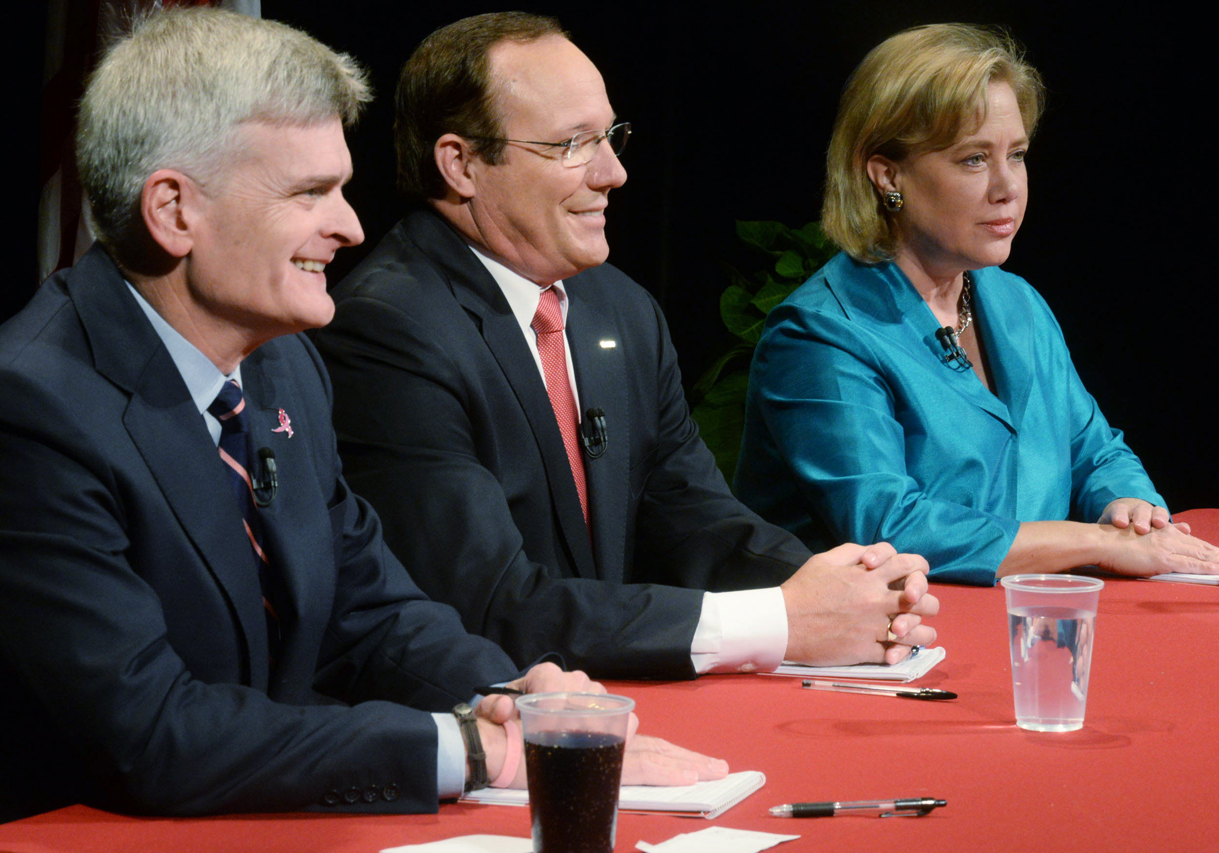 From left, Rep. Bill Cassidy, retired Air Force Col. Rob Maness, and Sen. Mary Landrieu wait moments before the debate, Tuesday, Oct. 14, 2014 at Centenary College in Shreveport, La. (AP)