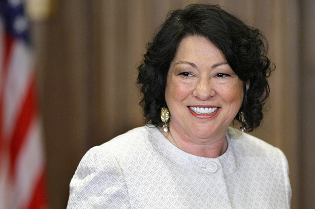 Sonia Sotomayor arrives to be sworn in as the Supreme Court's first Hispanic justice and only the third woman in the Court's 220-year history. (AP/J. Scott Applewhite)
