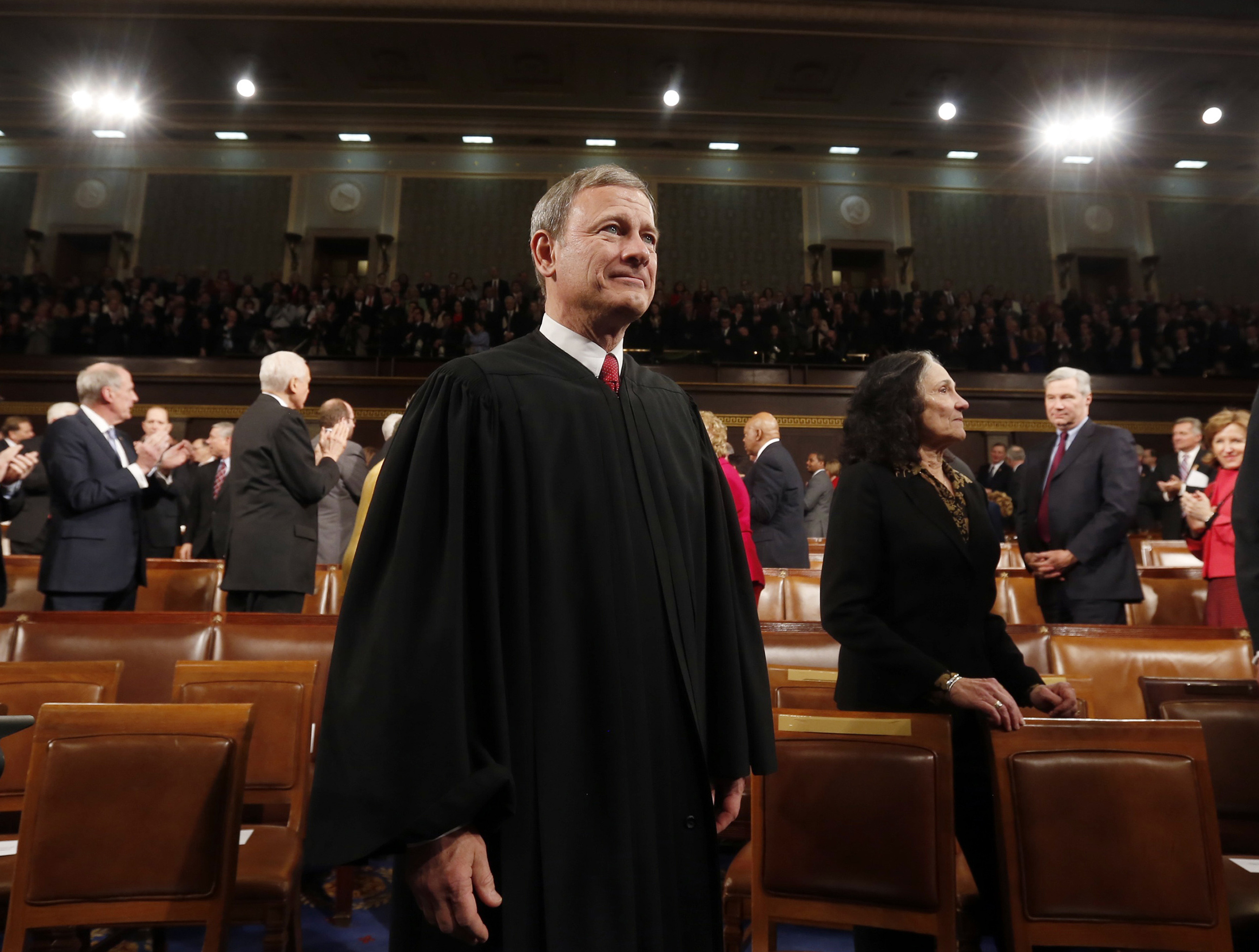 FILE - This Jan. 28, 2014 file photo shows Supreme Court Chief Justice John Roberts in the House chamber on Capitol Hill waiting for the President's State of the Union address to begin. Roberts is beginning his 10th year at the head of the Supreme Court, and the fifth with the same lineup of justices. He has been part of a five-justice conservative majority that has rolled back campaign finance limits, upheld abortion restrictions and been generally skeptical of the consideration of race in public life. But his court has taken a different path in cases involving gay and lesbian Americans, despite the chief justice's opposition most of the time. (AP Photo/Larry Downing, Pool) (AP)