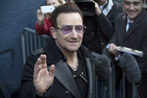 Bono leaves the recording of the Band Aid 30 charity single in west London,  November 15, 2014. (Reuters/Neil Hall)