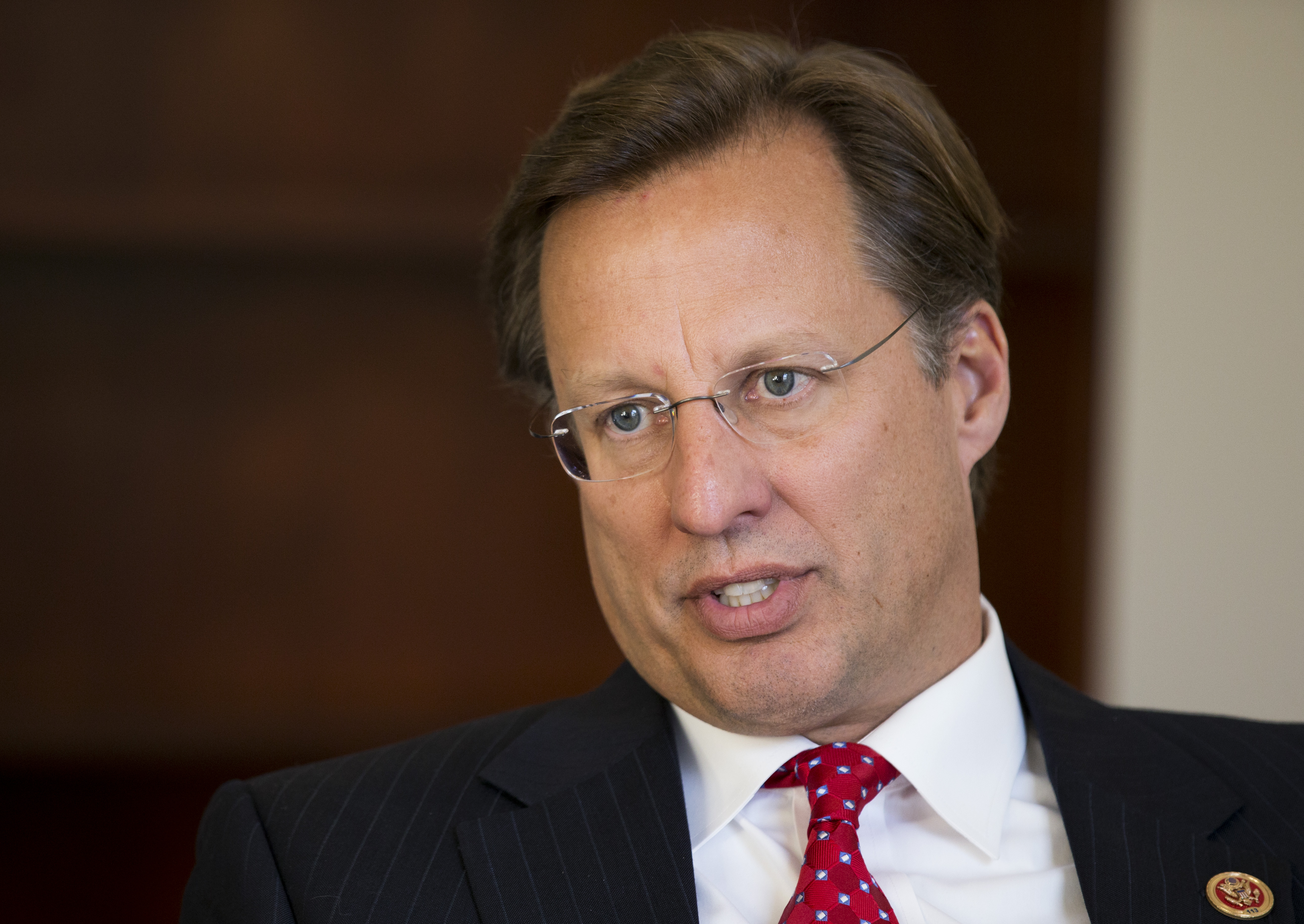 In this photo taken Nov. 18, 2014, freshman Rep. Dave Brat, R-Va., the economics professor who toppled former House Majority Leader Eric Cantor in the June GOP primary, in interviewed by The Associated press in his office on Capitol Hill in Washington, Tuesday, Nov. 18, 2014. Five months after his upset of Cantor, Brat comes across as down-to-earth and says his constituents have warned him not to let Washington change him. "Everyone just says, Dave, keep being yourself, Brat said in an interview in his sparsely decorated office this week. You better not change. You better keep being Dave." (AP Photo/Manuel Balce Ceneta) (AP)