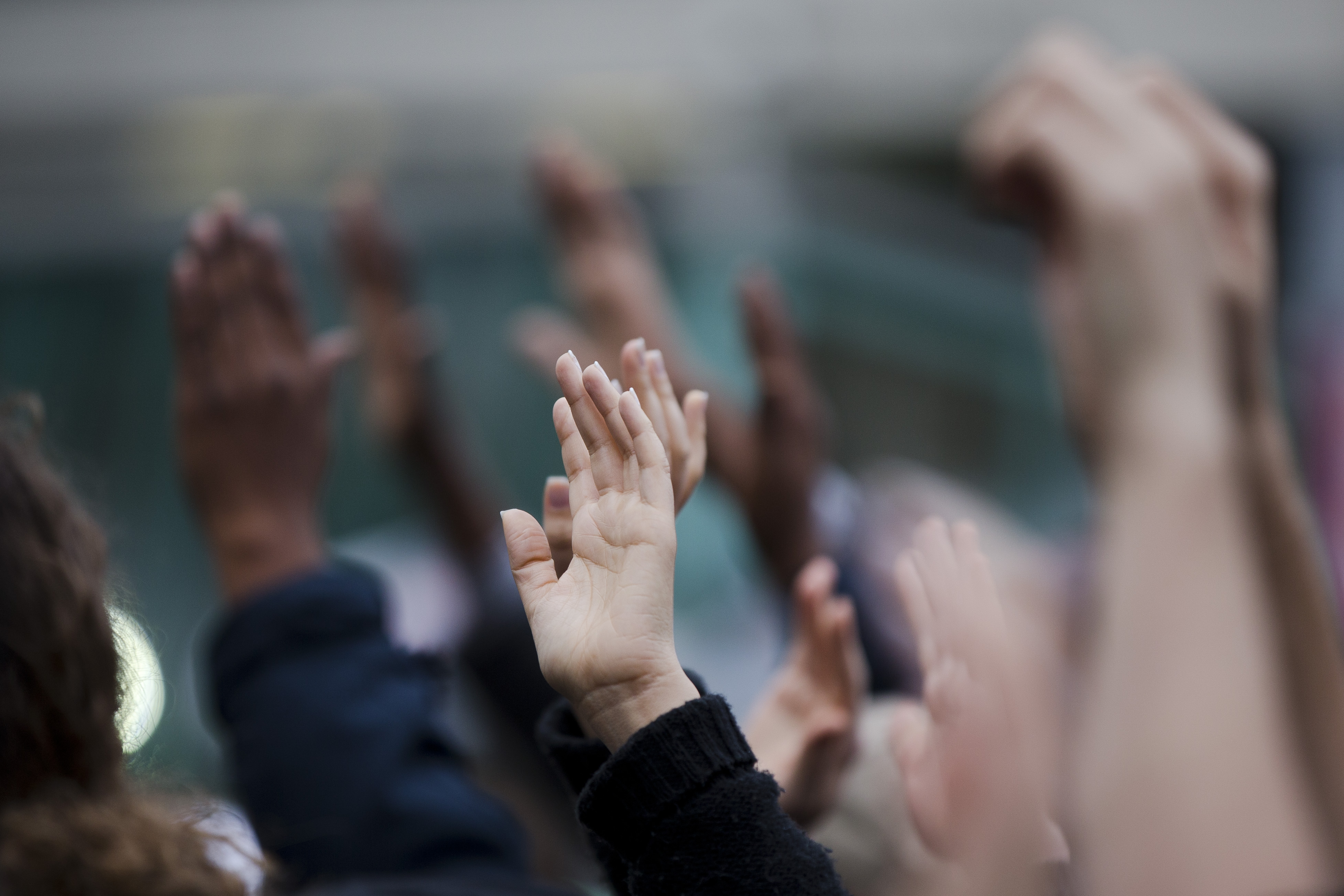 Demonstrators hold up their hands during a protest Tuesday, Nov. 25, 2014, in Philadelphia, the day after a grand jury's decision not to indict a white Ferguson, Mo., police officer who killed 18-year-old black Michael Brown.  (AP Photo/Matt Rourke) (AP)