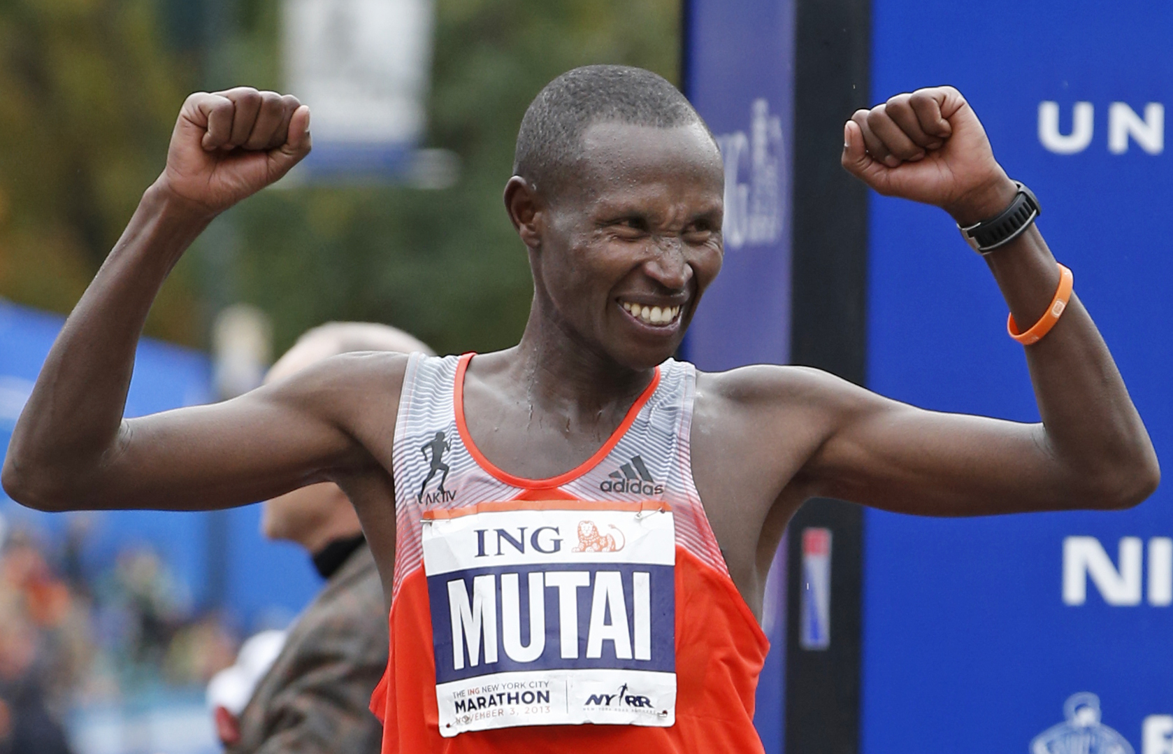 FILE - Geoffrey Mutai of Kenya celebrates his first place win in the men's division of the New York City Marathon, in this Nov. 3, 2013 file photo taken in New York. He seeks to become the first man to win three straight NYC Marathon titles since Alberto Salazar from 1980-82. (AP Photo/Kathy Willens, File) (AP)