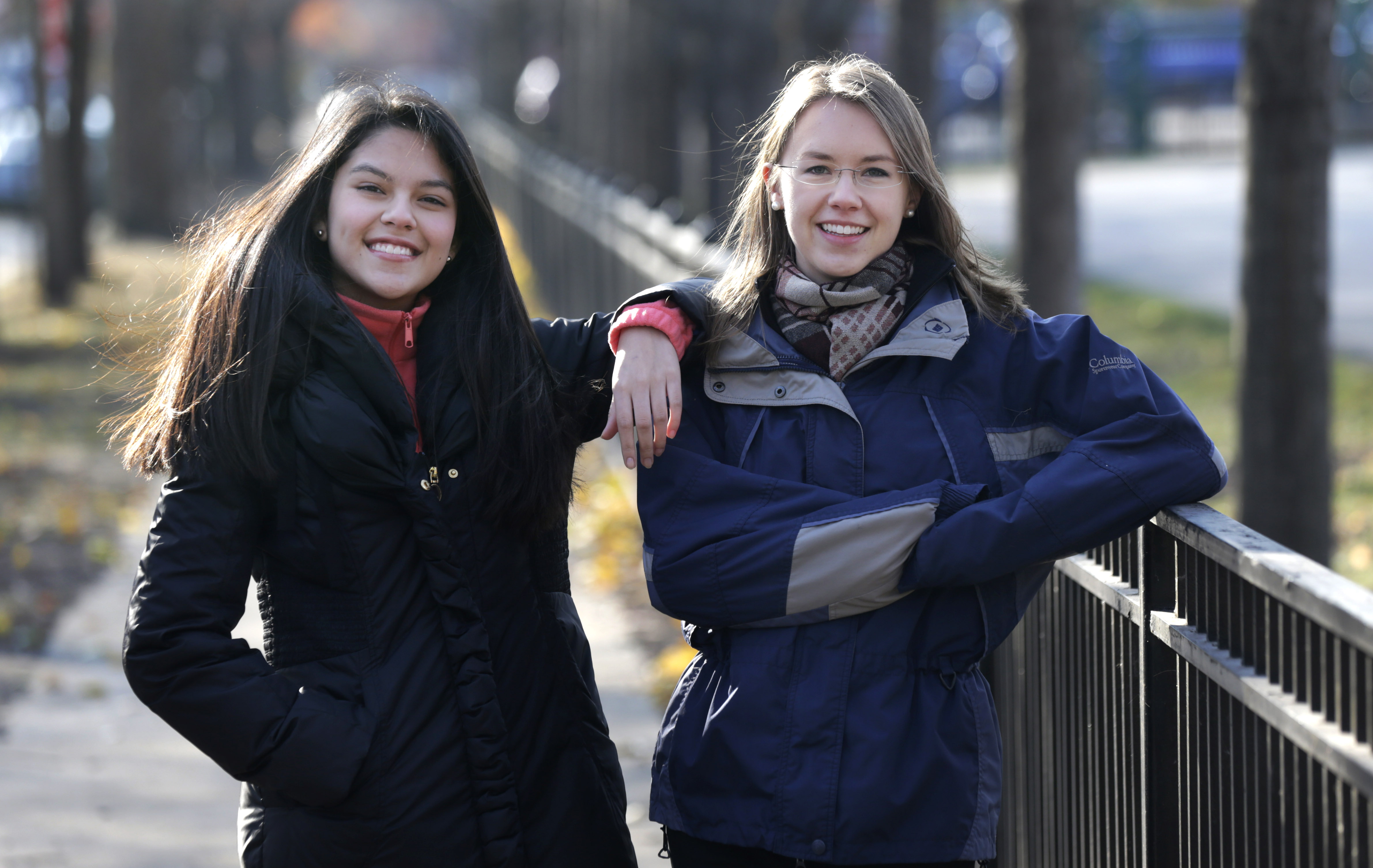 In this Nov. 19, 2014 photo, Lakeview High School teacher Kristin Hu, right, who attends the LaSalle Street Church, poses for a portrait with student Lucy, outside the school in Chicago. In September, members and regulars at the church each received $500 checks from the church. Hu plans to give $500 to a Dreamer organization or start a scholarship foundation for the kids. Lucy, a Mexican-born Dreamer in her class, inspired Hu after she spoke of how she and others want to attend college but dont qualify for financial aid because of their immigration status. (AP Photo/Charles Rex Arbogast) (AP)