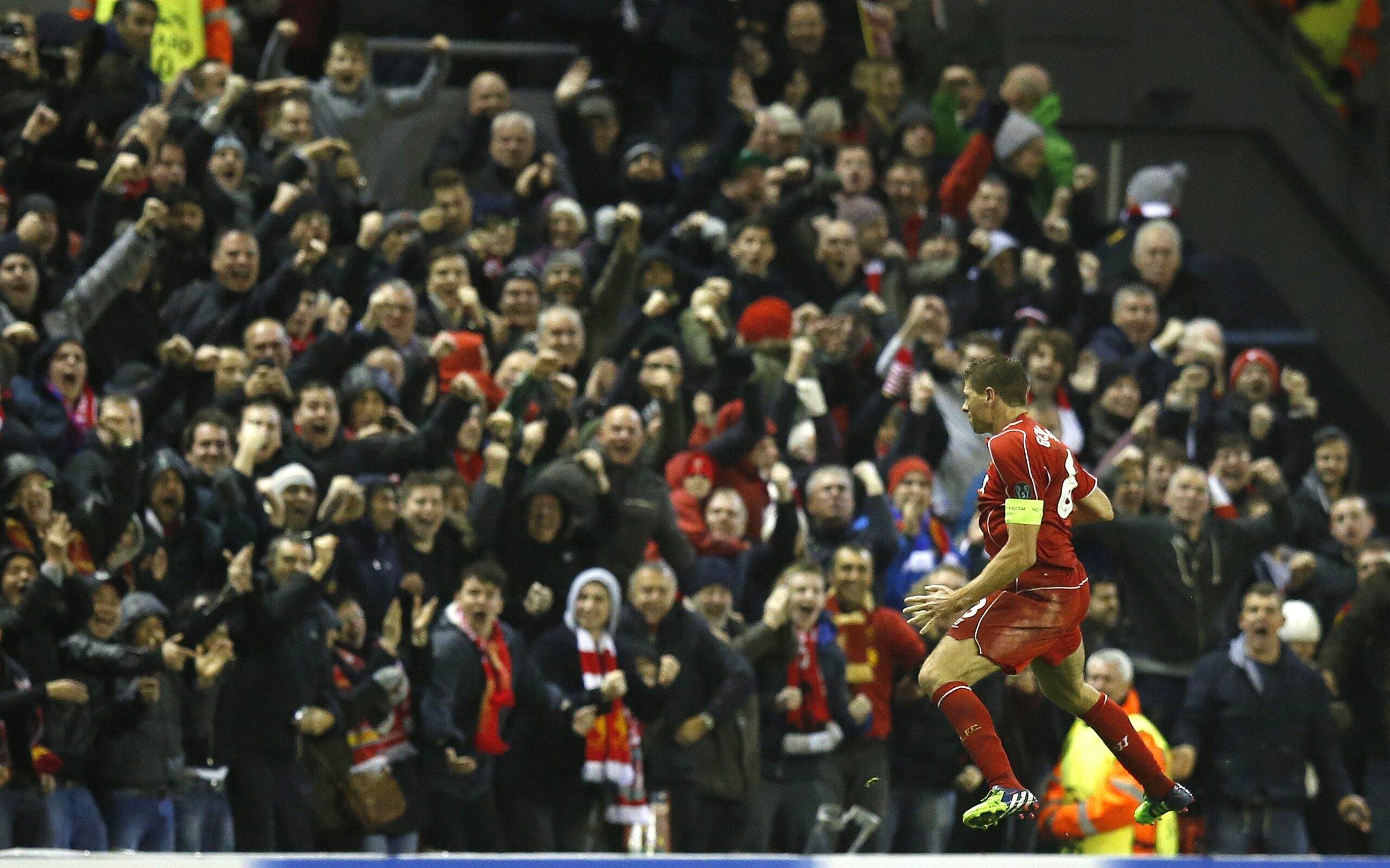 Liverpool's Steven Gerrard celebrates after scoring his side's first goal during the Champions League Group B soccer match between Liverpool and FC Basel at Anfield Stadium in Liverpool, England, Tuesday, Dec. 9, 2014. (AP Photo/Jon Super) (Jon Super)