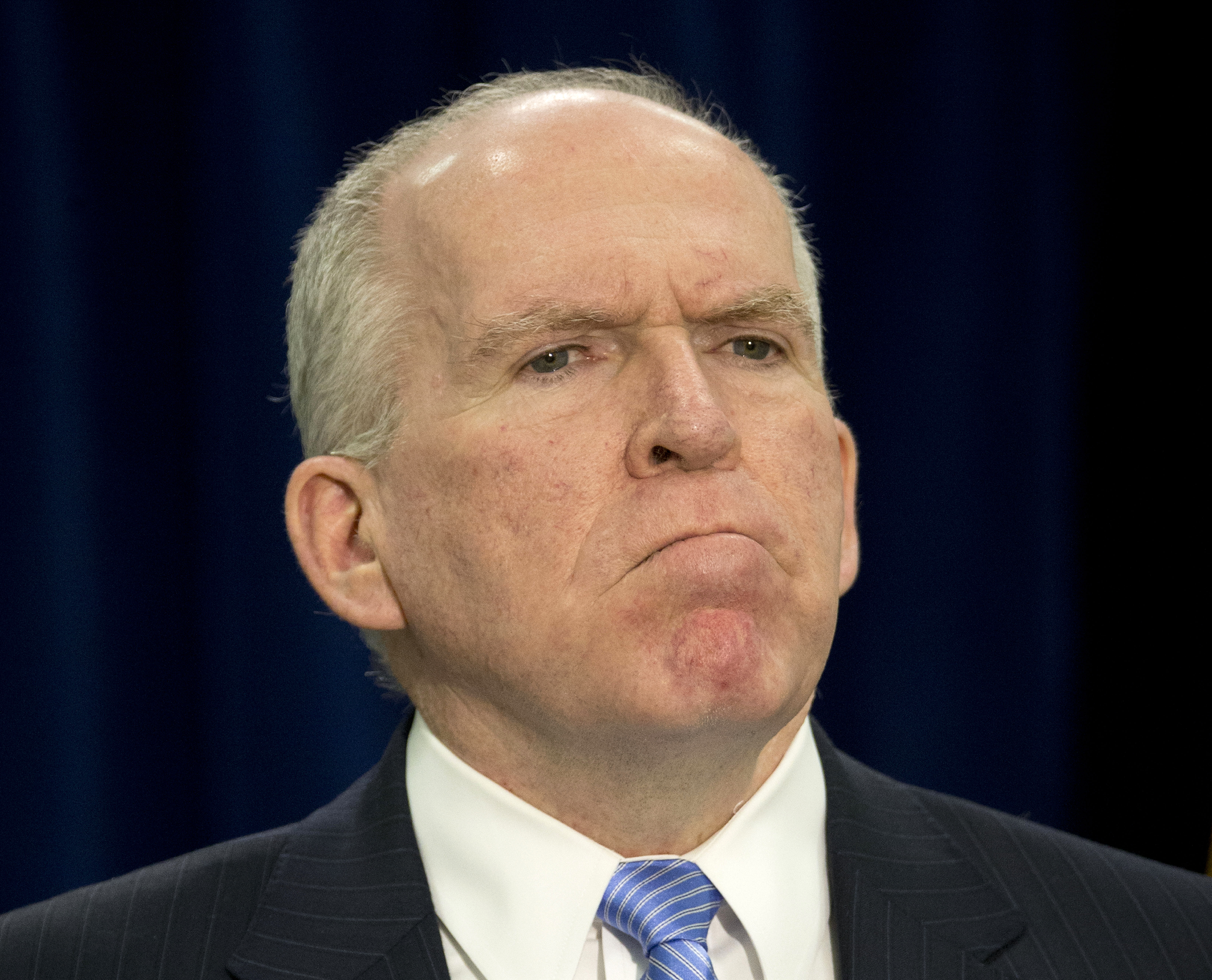In this Dec. 11, 2014, file photo, CIA Director John Brennan pauses during a news conference at CIA headquarters in Langley, Va. The Senate report on the CIAs interrogation program and the spy agencys official response clash on almost every aspect of the long-secret operation, from the brutality and effectiveness of its methods to the agencys secret dealings with the Bush White House, Congress and the media. But both reports largely agree on one major CIA failure, the agencys mismanagement of the now-shuttered program. (AP Photo/Pablo Martinez Monsivais, File) (AP/Pablo Martinez Monsivais, File)